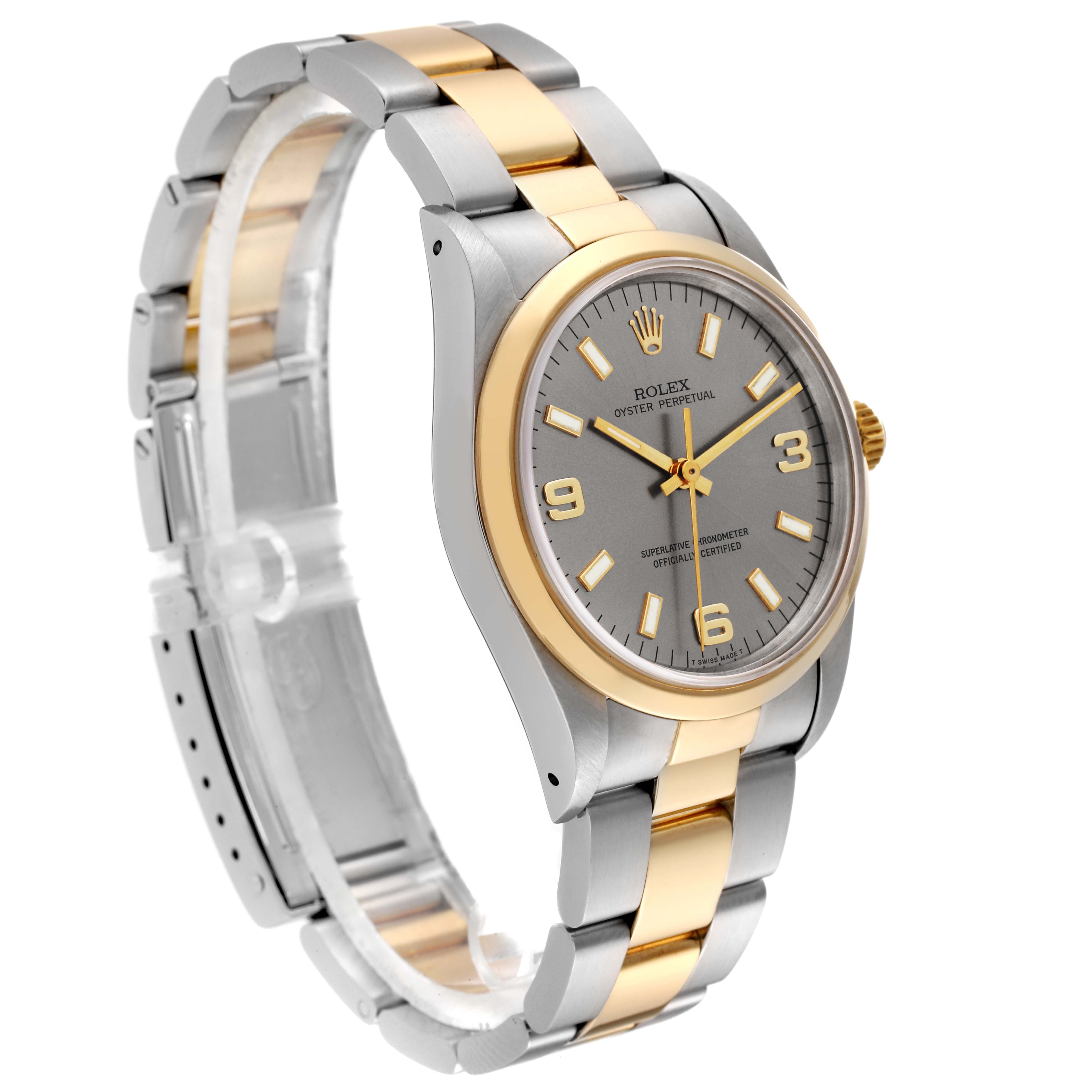 The Rolex Oyster Perpetual 14203 Men's Steel and Gold (two tone) Grey Dial 14203 Men's Steel and Gold (two tone) Grey Dial watch is shown at a three-quarter angle, highlighting the dial, bezel, and bi-color bracelet.