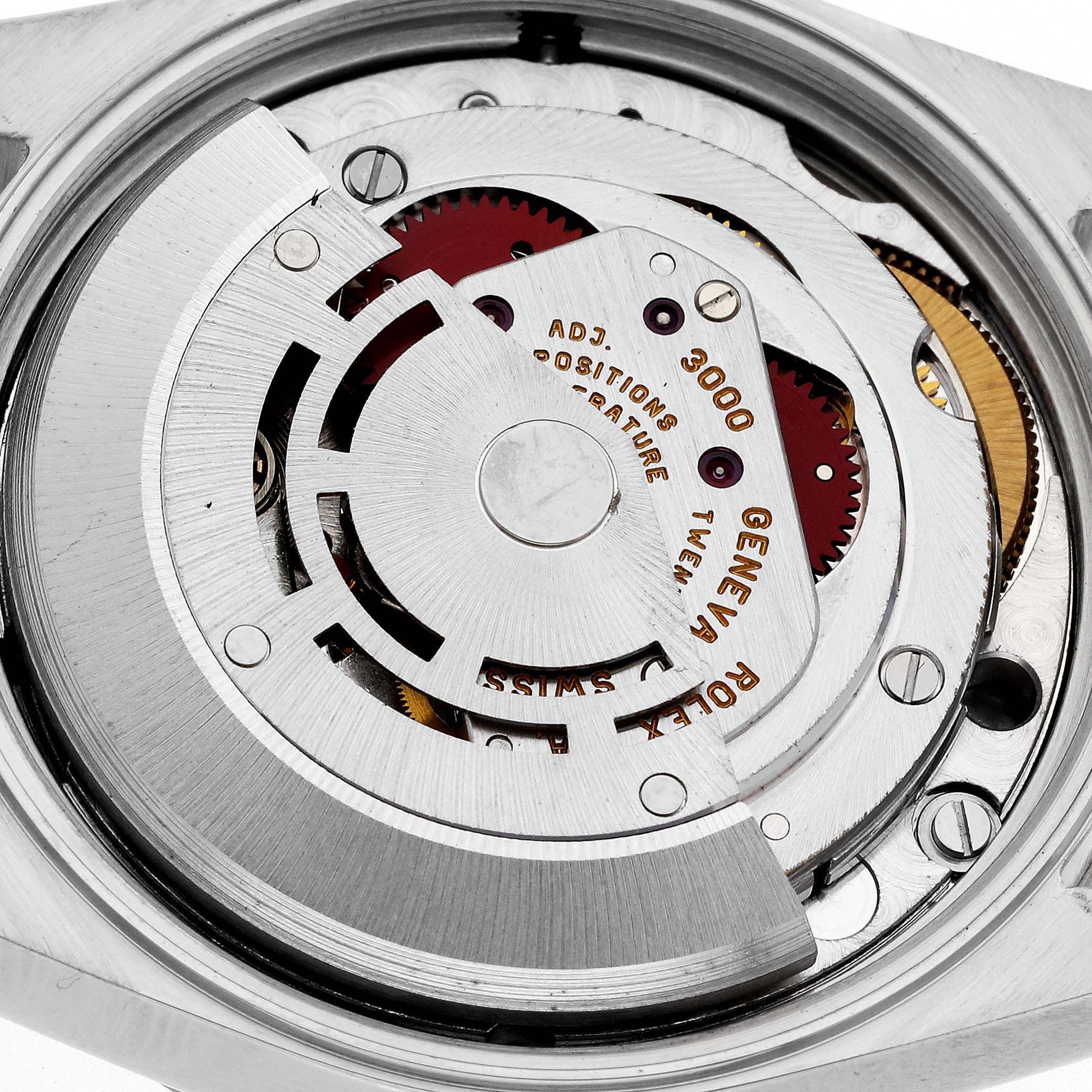This image shows the movement mechanism of a Rolex Oyster Perpetual 14203 Men's Steel and Gold (two tone) Grey Dial 14203 Men's Steel and Gold (two tone) Grey Dial watch from a rear angle.