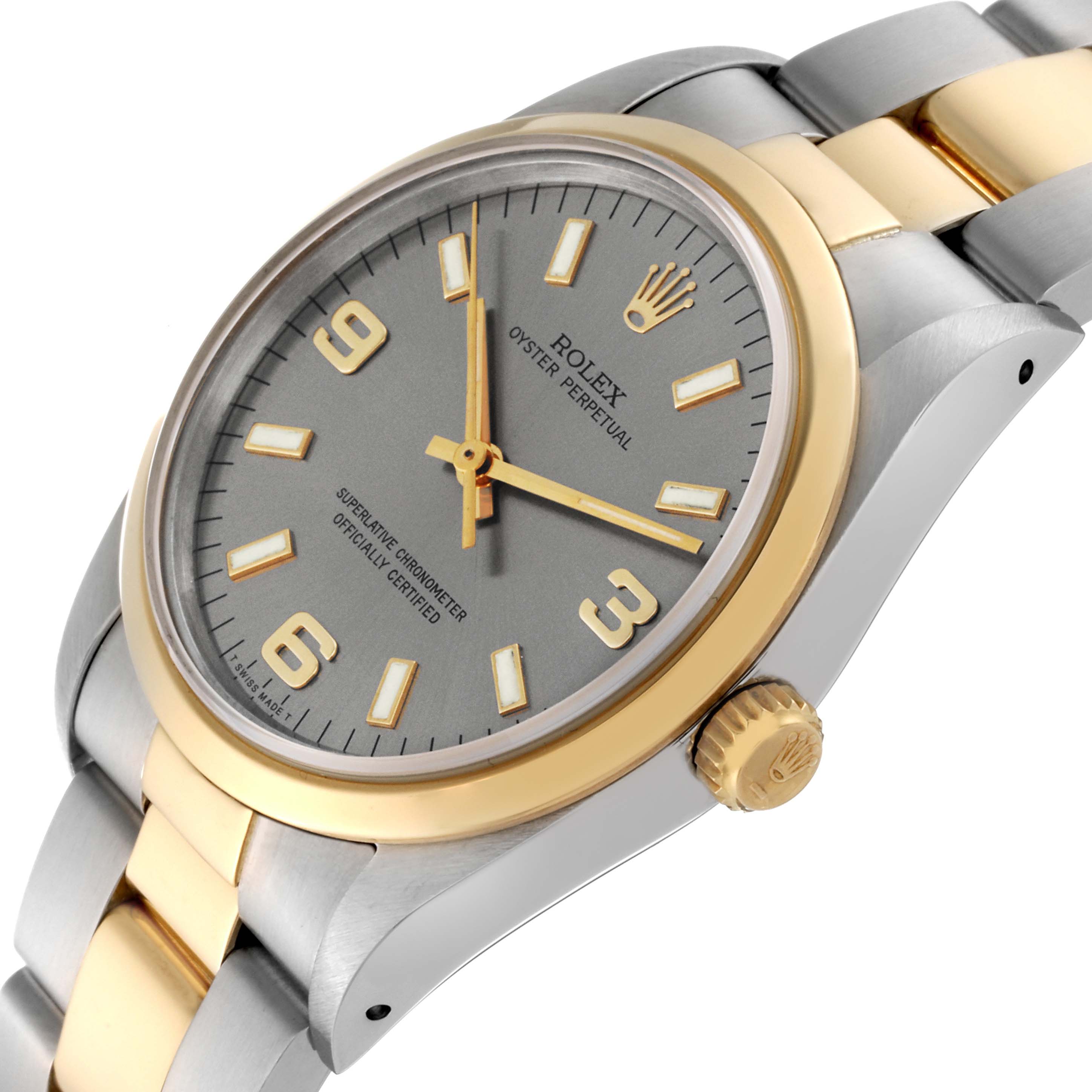 The image shows a close-up angled view of the Rolex Oyster Perpetual 14203 Men's Steel and Gold (two tone) Grey Dial 14203 Men's Steel and Gold (two tone) Grey Dial watch, highlighting the dial, bezel, and part of the bracelet.