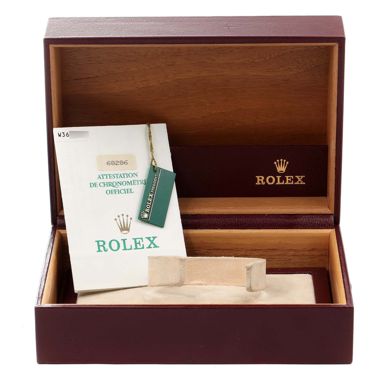 The image shows the open box for a Rolex President 68286 Women
s Platinum Silver Dial 68286 Women
s Platinum Silver Dial model, with the official chronometer certification and tag.