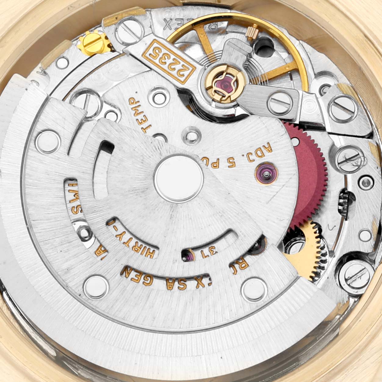 This is a close-up of the Rolex President 79178 Women
s Yellow Gold Champagne Dial 79178 Women
s Yellow Gold Champagne Dial model watch movement mechanism.