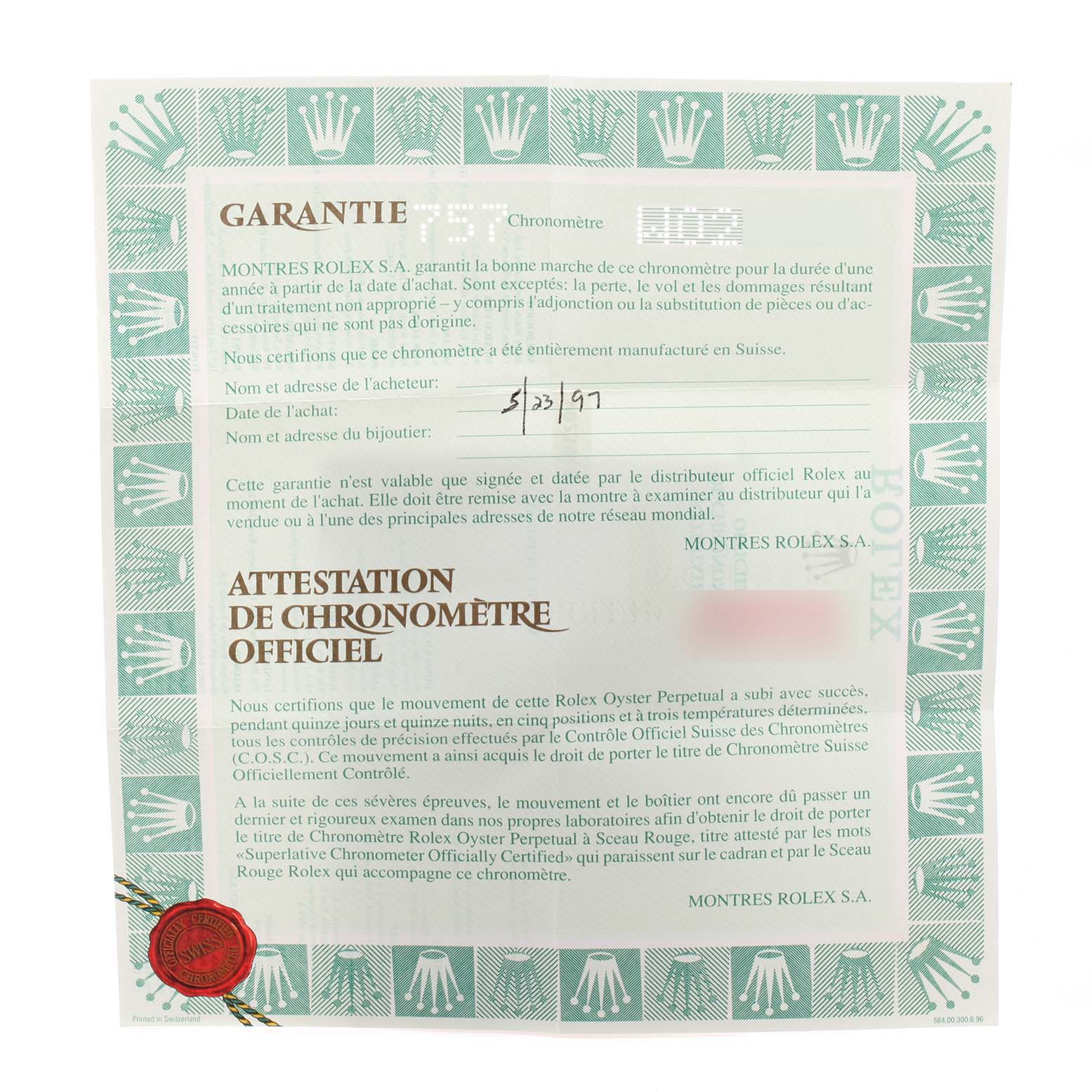 This image shows a warranty certificate for the Rolex President 69158 Women
s Yellow Gold Black Dial 69158 Women
s Yellow Gold Black Dial model watch, dated 5/23/97.