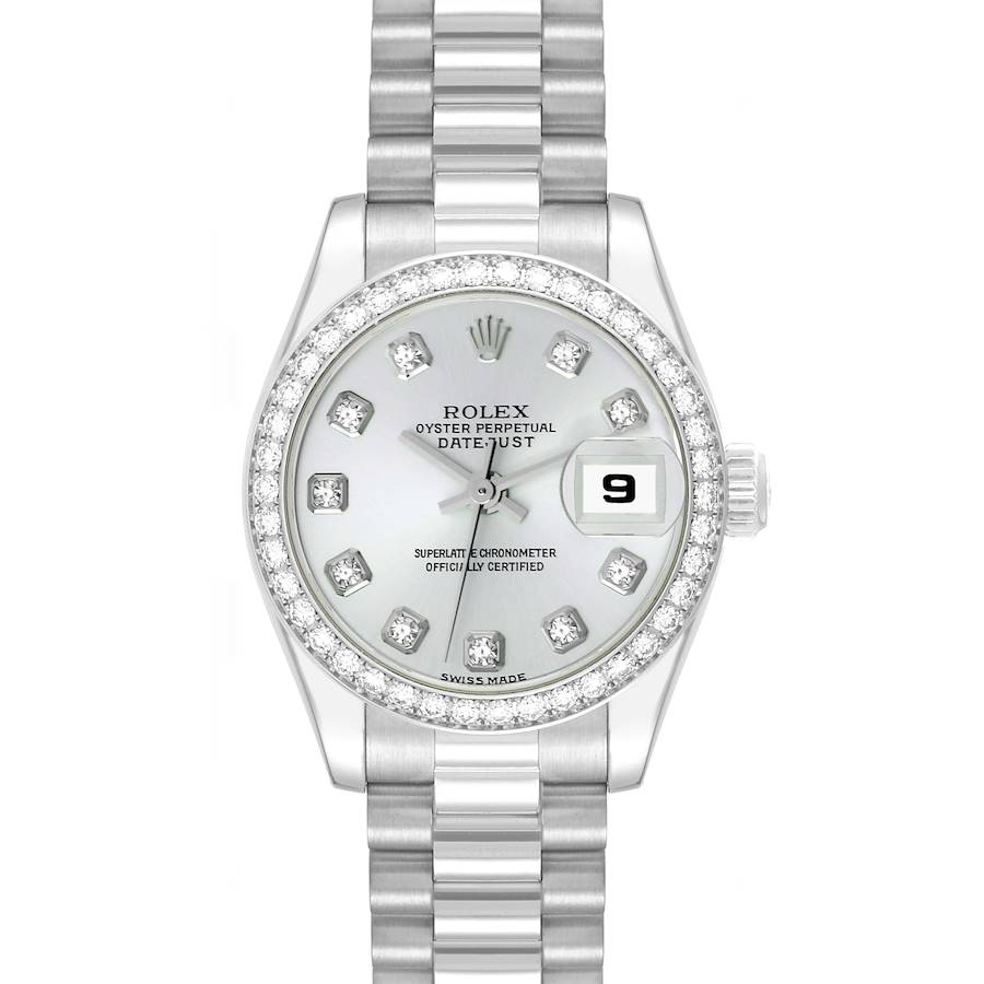 The Rolex President model watch is shown from the front, displaying its face, bezel, and part of the bracelet.