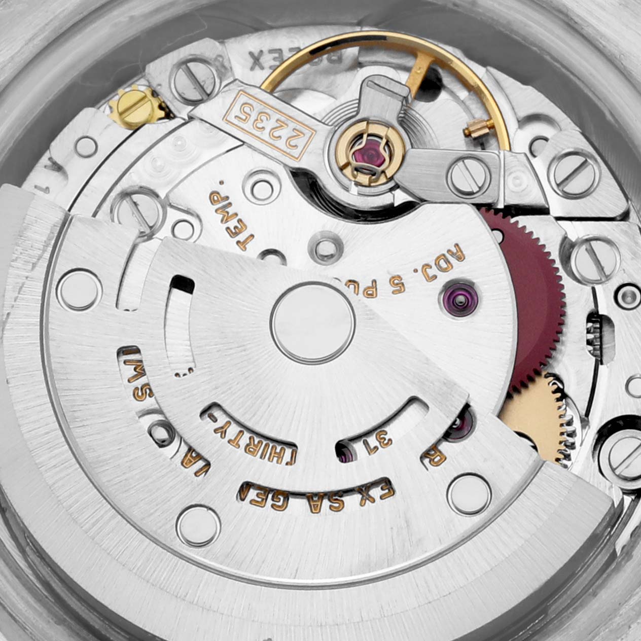 This image shows a close-up of the internal mechanism of a Rolex President 179136 Women's Platinum Silver Dial 179136 Women's Platinum Silver Dial model watch, highlighting the movement gears and rotor.