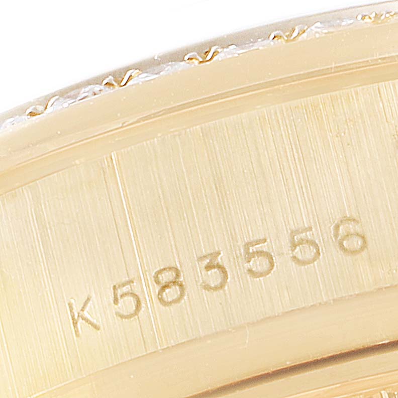 The image shows the case side serial number engraving on a Rolex President 179158 Women's Yellow Gold Black Dial 179158 Women's Yellow Gold Black Dial model watch.