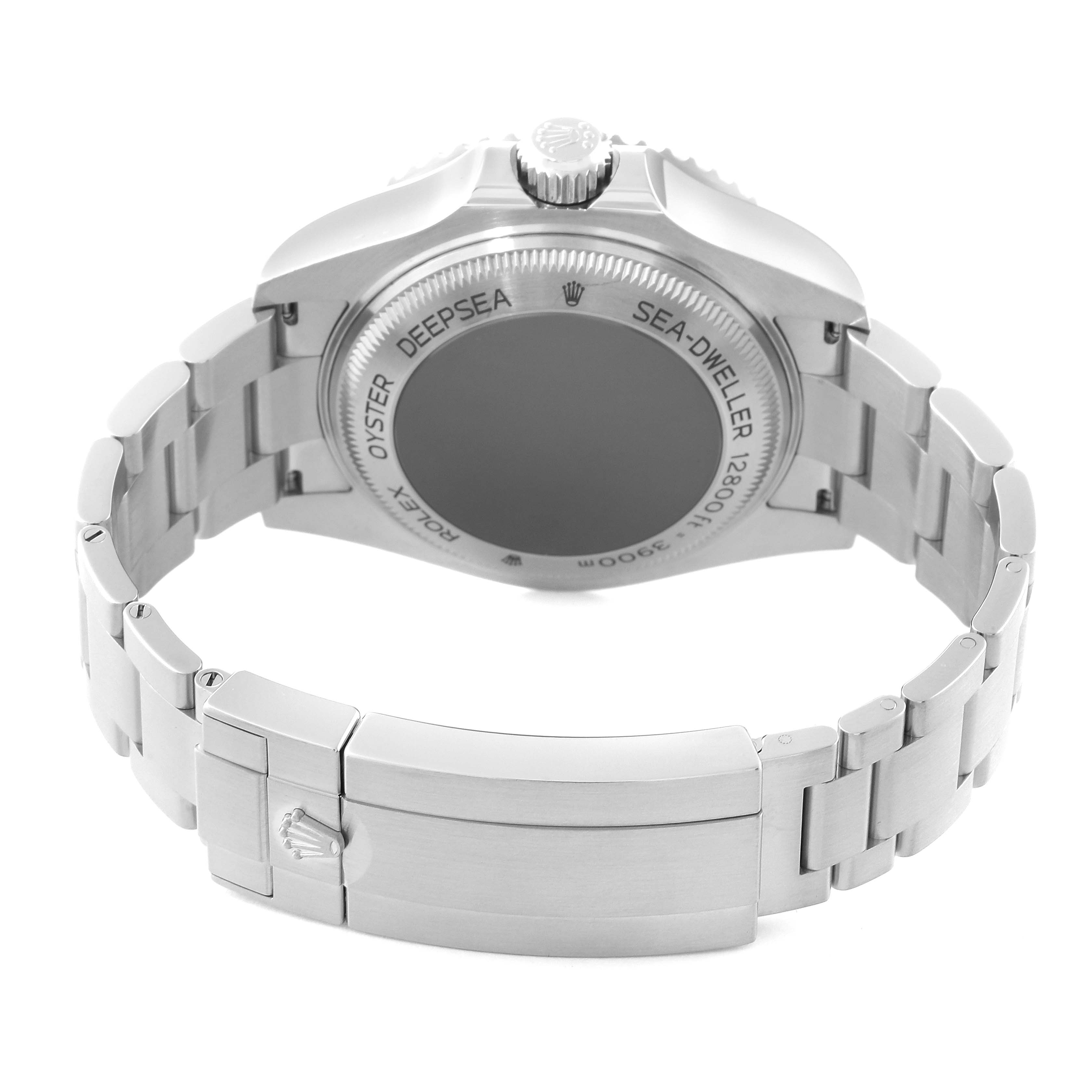 The image shows the back view of a Rolex Sea-Dweller 126660 Men's Stainless Steel Blue Dial 126660 Men's Stainless Steel Blue Dial watch, highlighting the case back and part of the bracelet.