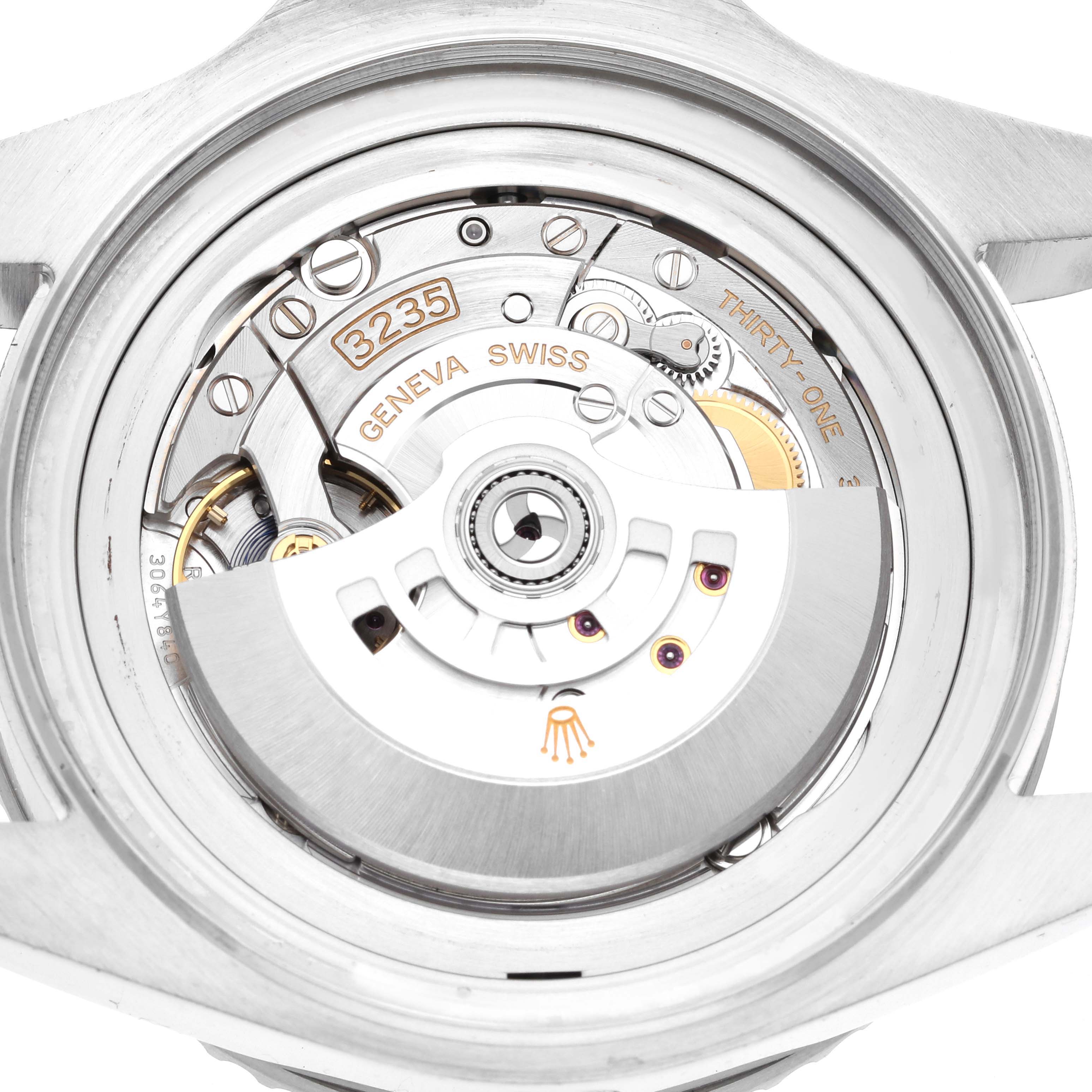 This image shows the caseback and movement of a Rolex Sea-Dweller 126660 Men's Stainless Steel Blue Dial 126660 Men's Stainless Steel Blue Dial watch at a close-up angle, highlighting its mechanical components.