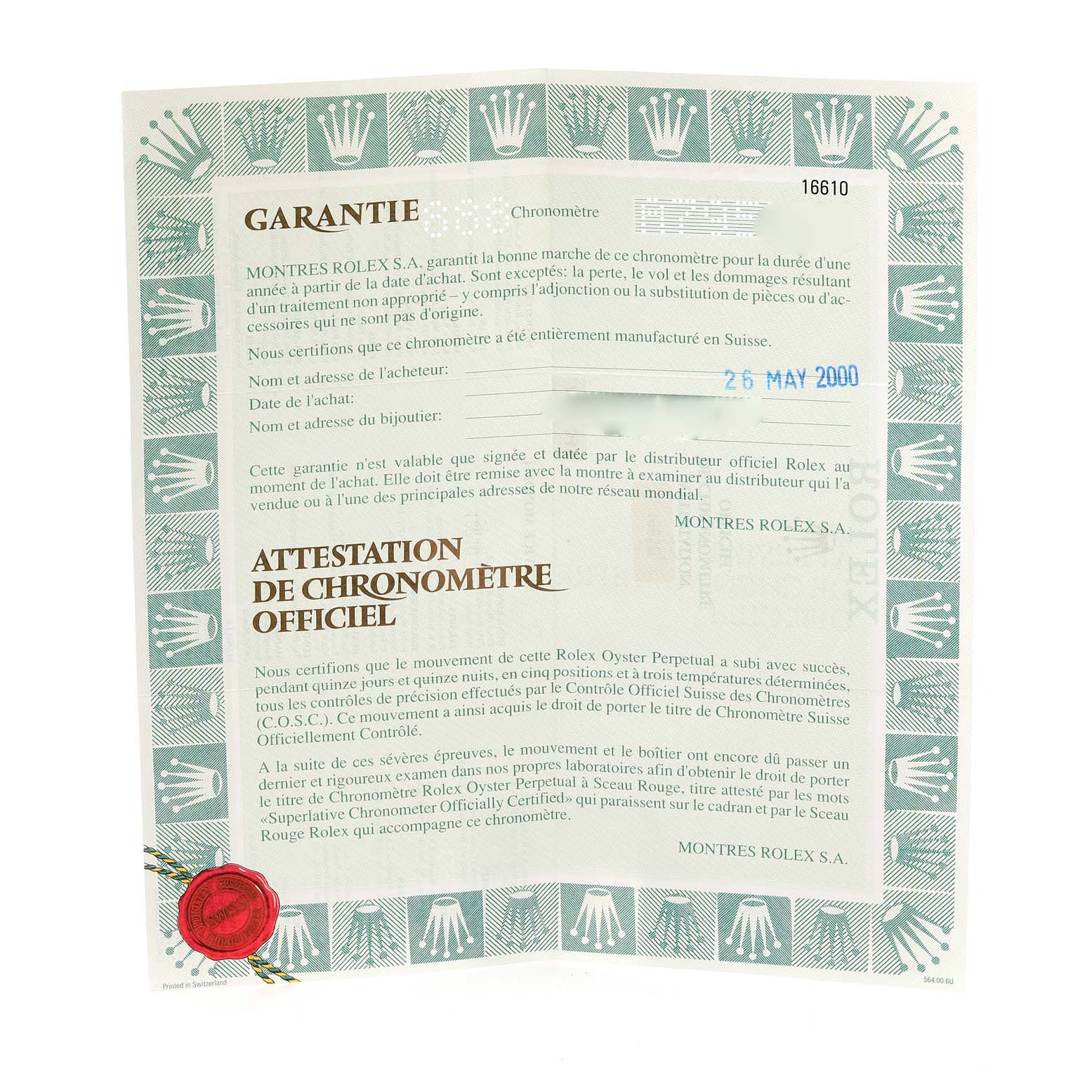 The image shows a Rolex Submariner 16610 Men
s Stainless Steel Black Dial 16610 Men
s Stainless Steel Black Dial warranty certificate with a green border and text in French, dated 26 May 2000.