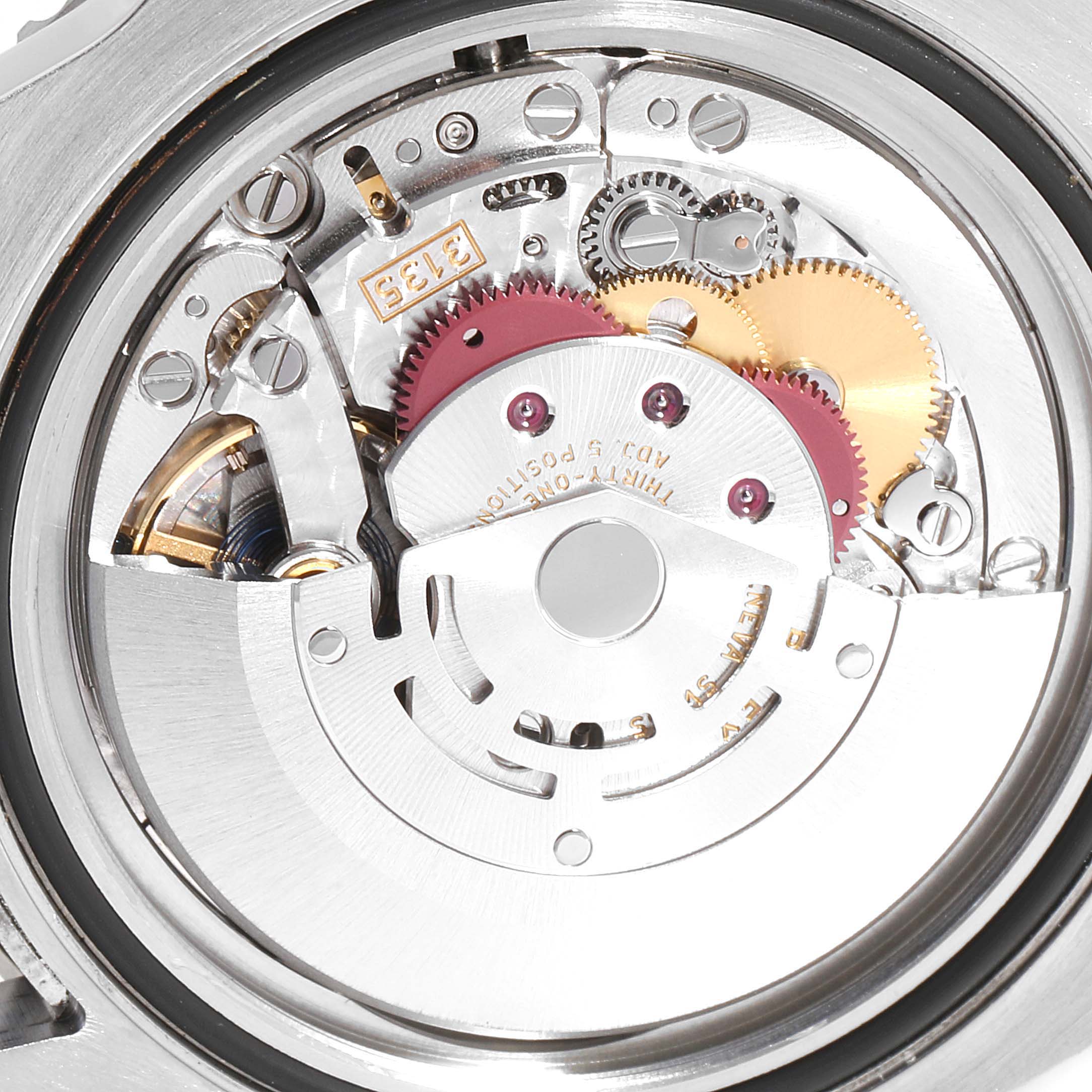 This close-up image shows the intricate internal movement components of the Rolex Submariner 116610LV  Men
s Stainless Steel Green Dial 116610LV  Men
s Stainless Steel Green Dial watch model.