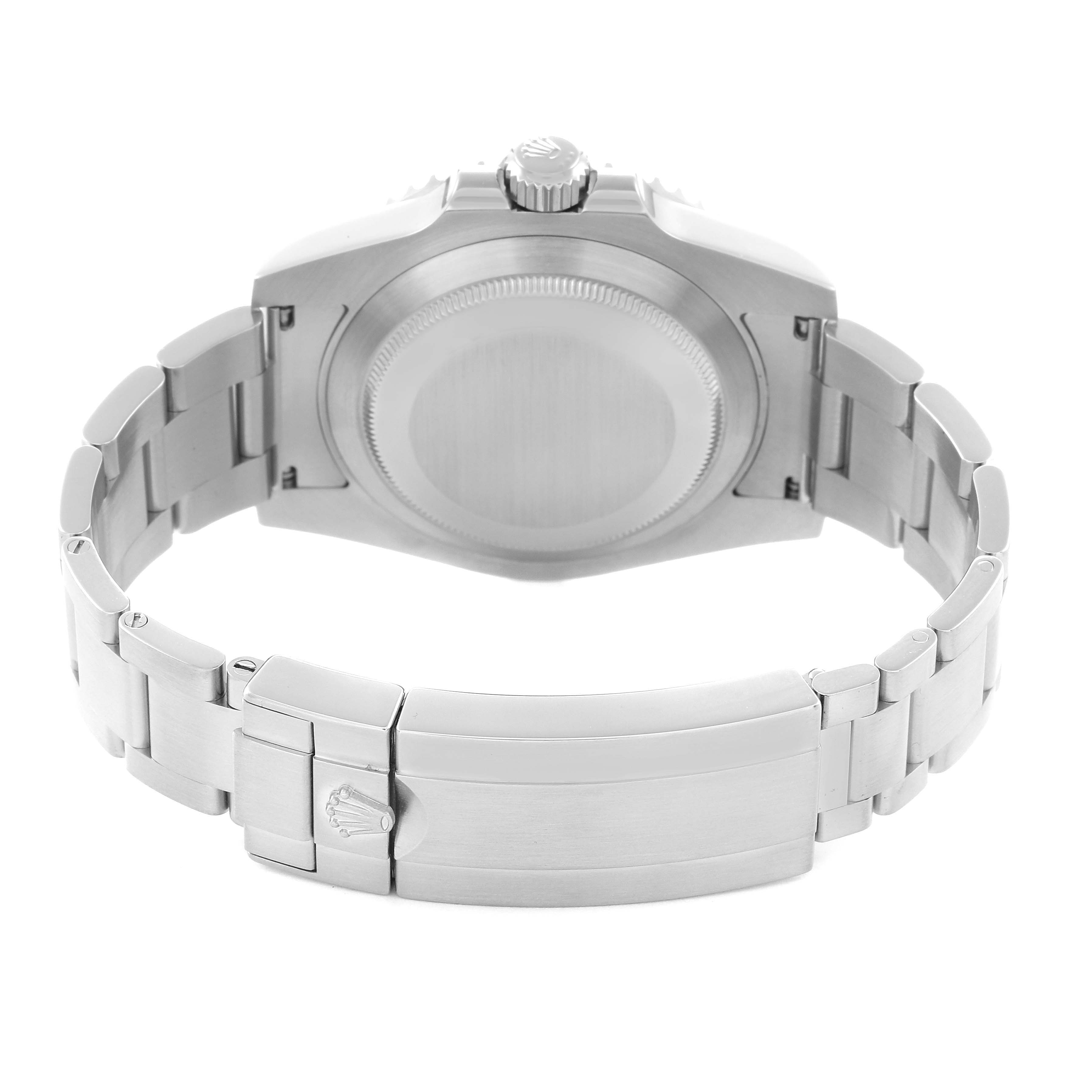 The image shows the back view of a Rolex Submariner 116610LV Men's Stainless Steel Green Dial 116610LV Men's Stainless Steel Green Dial, highlighting its case back and closed clasp bracelet.