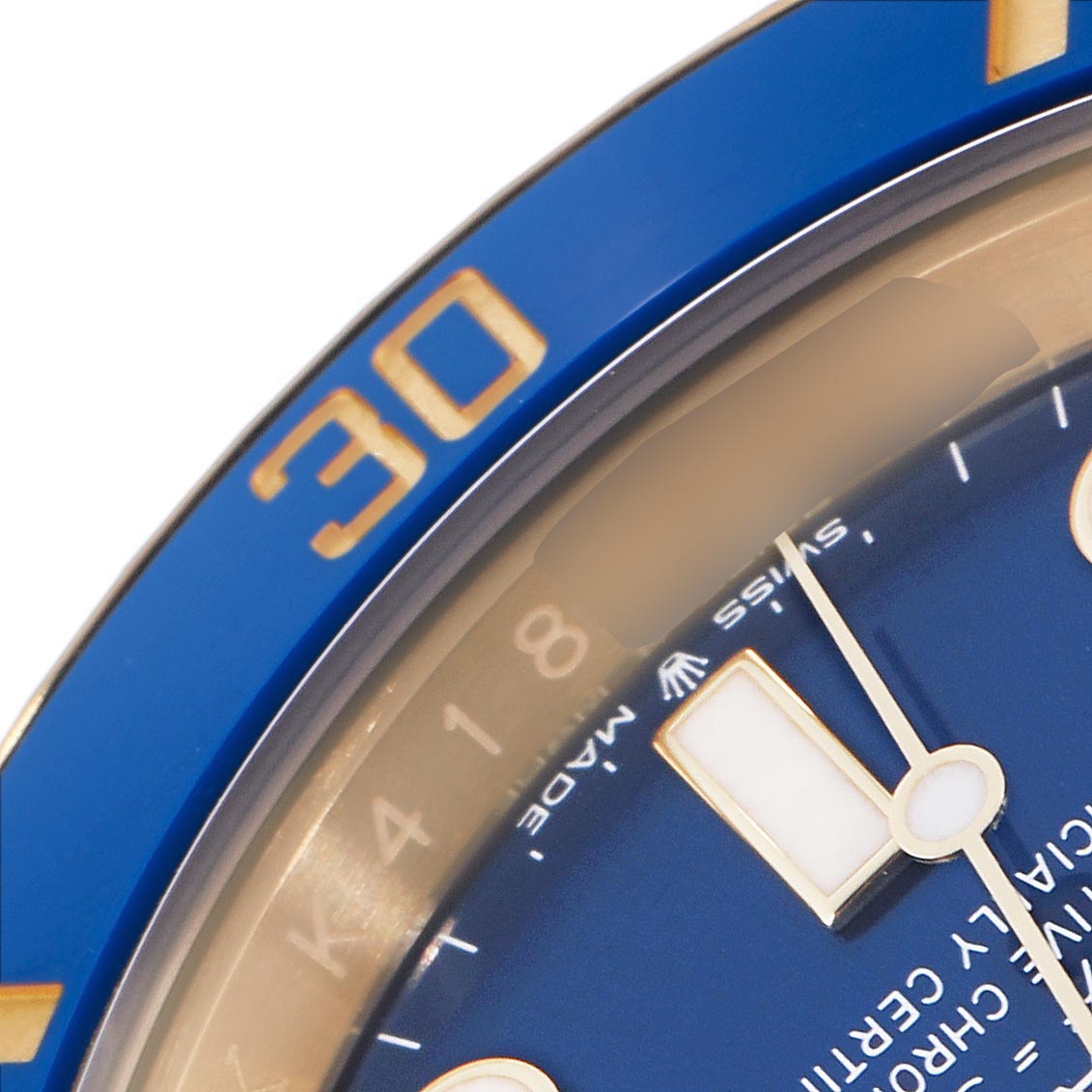 The image shows a close-up of the Rolex Submariner 126618LB Men's Yellow Gold Blue Dial 126618LB Men's Yellow Gold Blue Dial's blue dial and bezel, highlighting the "30" mark and part of the minute hand.