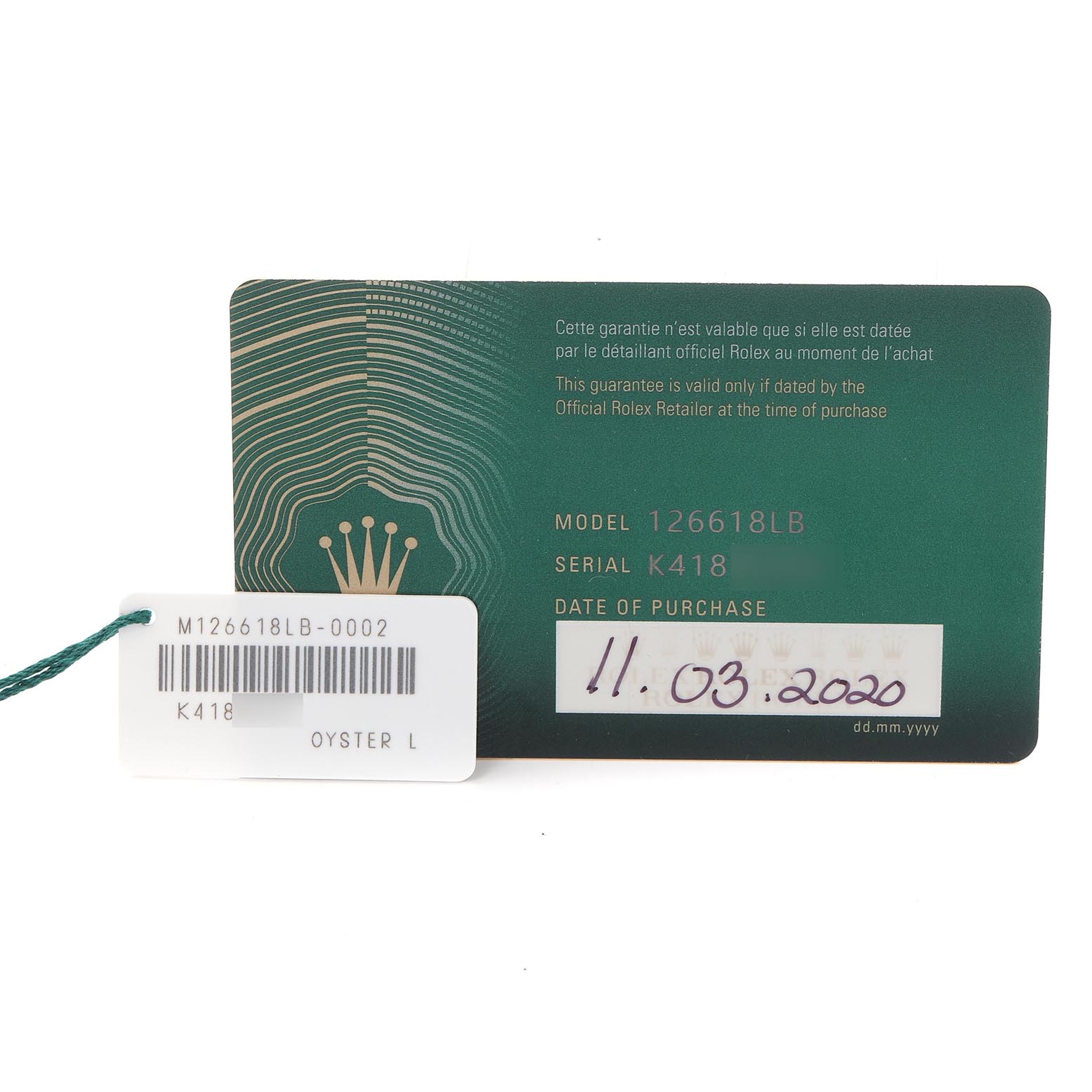 The image shows a Rolex Submariner 126618LB Men's Yellow Gold Blue Dial 126618LB Men's Yellow Gold Blue Dial model 126618LB warranty card and tag with the date of purchase.