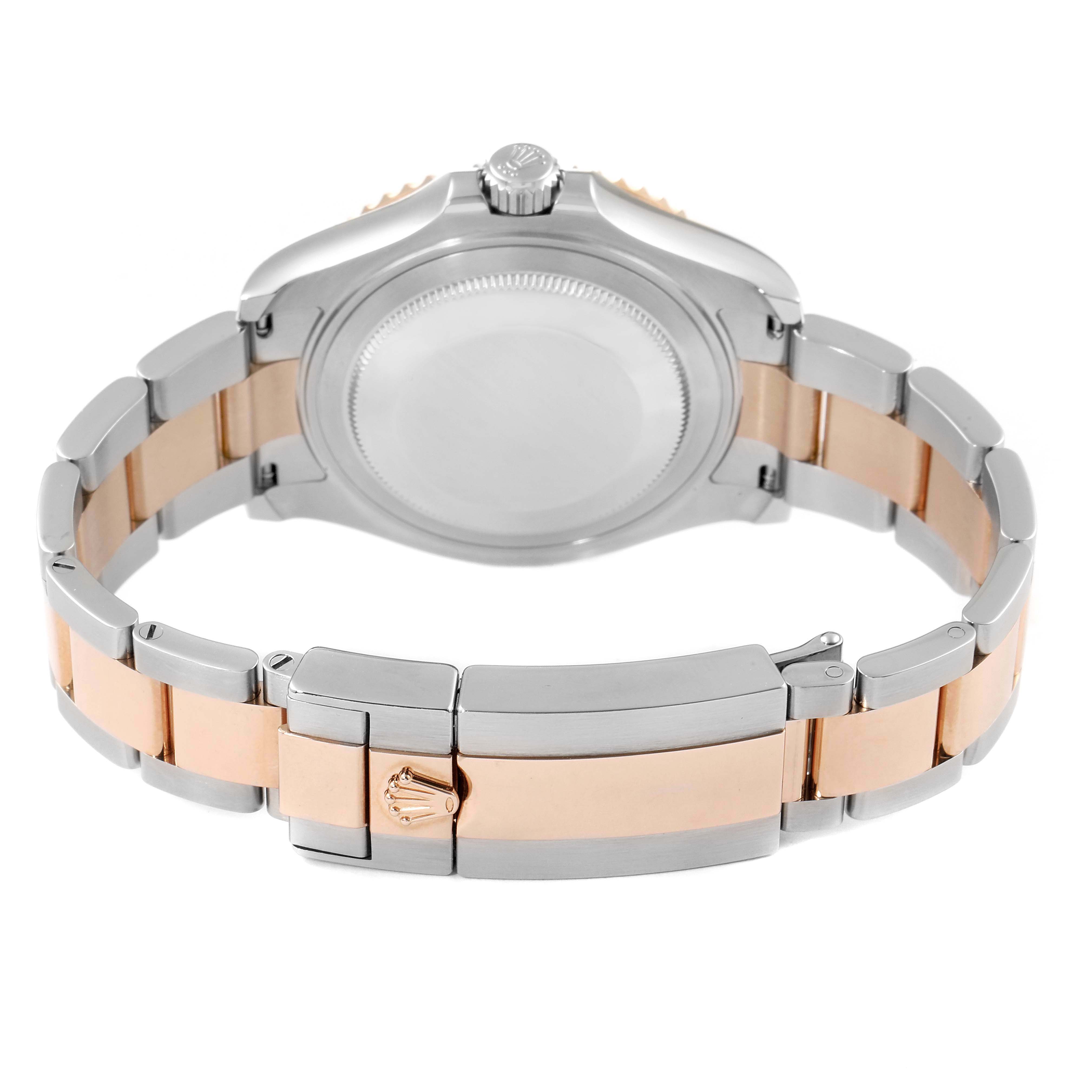 The image shows the back and clasp of a Rolex Yacht-Master 268621 Men
s Steel and Gold (two tone) Black Dial 268621 Men
s Steel and Gold (two tone) Black Dial watch, highlighting its two-tone bracelet.