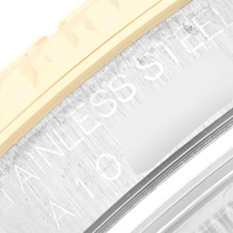 This image shows a close-up of the side of the Yacht-Master watch by Rolex, highlighting the stainless steel and text engraving.