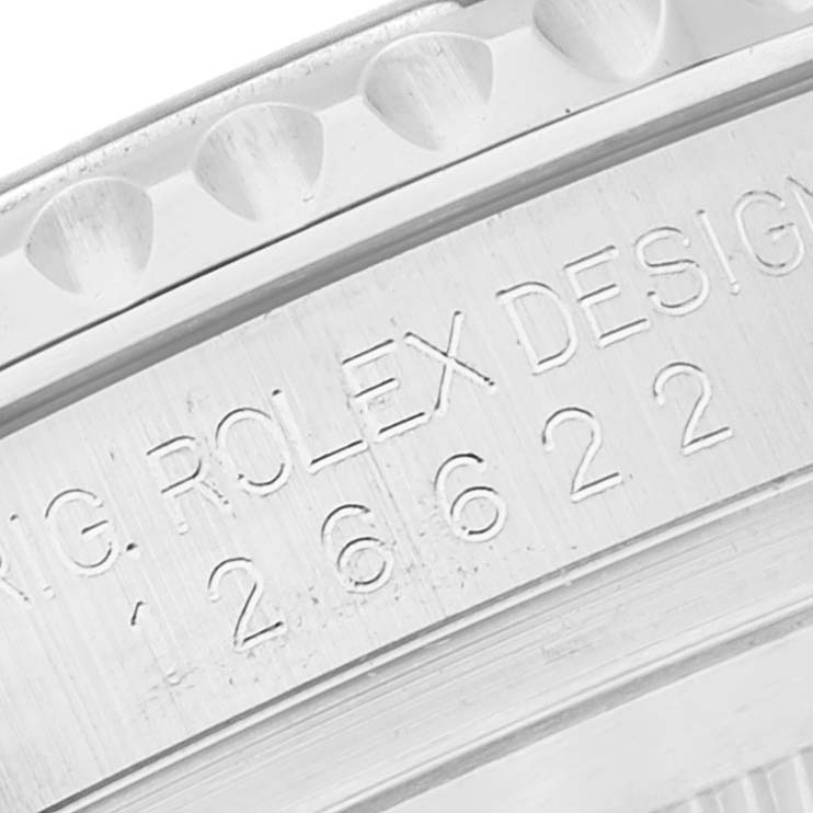 The image shows a close-up of the engraved bezel and inner case rim of a Rolex Yacht-Master 126622 Men's Stainless Steel Blue Dial 126622 Men's Stainless Steel Blue Dial watch.