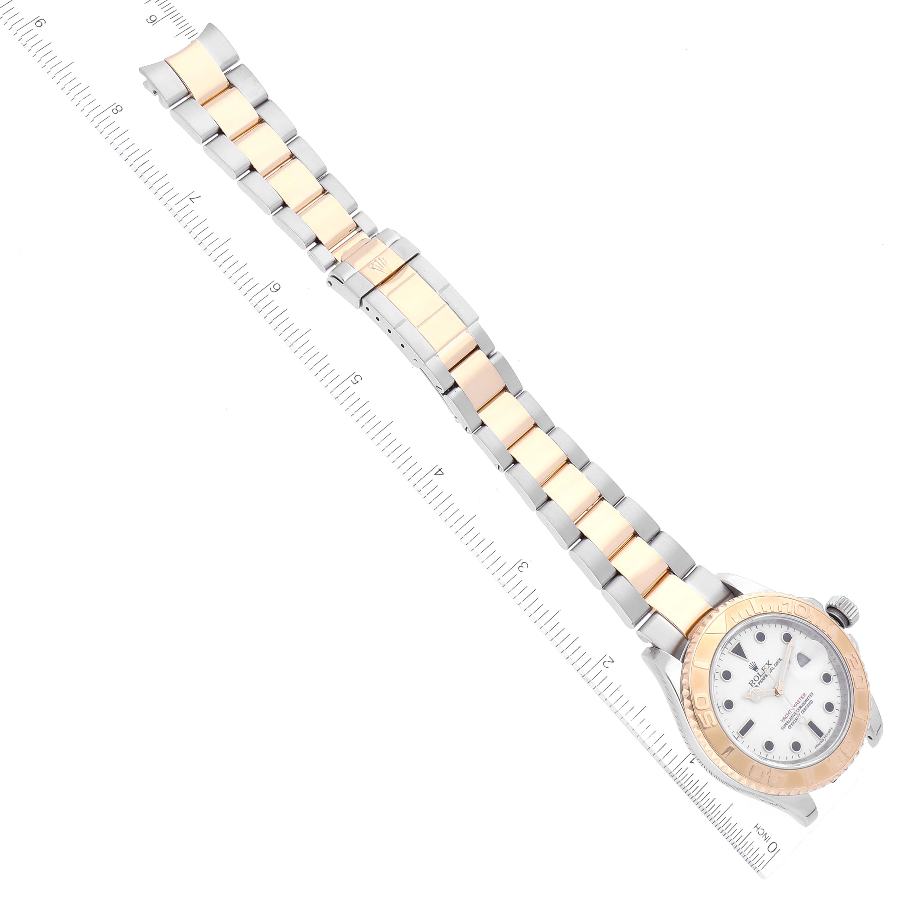 The Rolex Yacht-Master 16623 Men's Steel and Gold (two tone) White Dial 16623 Men's Steel and Gold (two tone) White Dial watch is shown in a top-down angle, displaying its full length, including the face and two-tone bracelet.