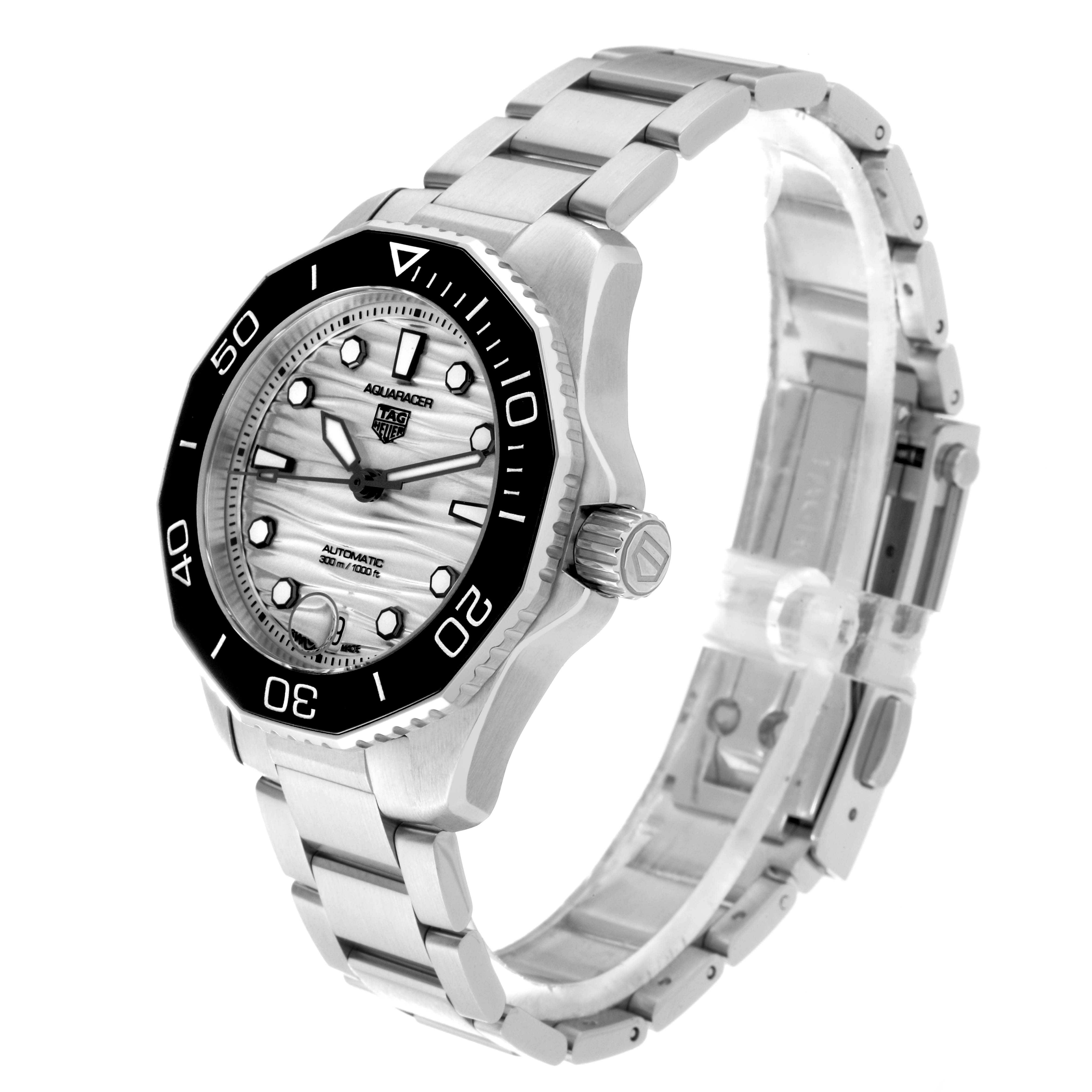 The image shows a side angle of a Tag Heuer Aquaracer WBP231C.BA0626 Women's Stainless Steel Silver Dial WBP231C.BA0626 Women's Stainless Steel Silver Dial watch, highlighting the face, bezel, crown, and bracelet.