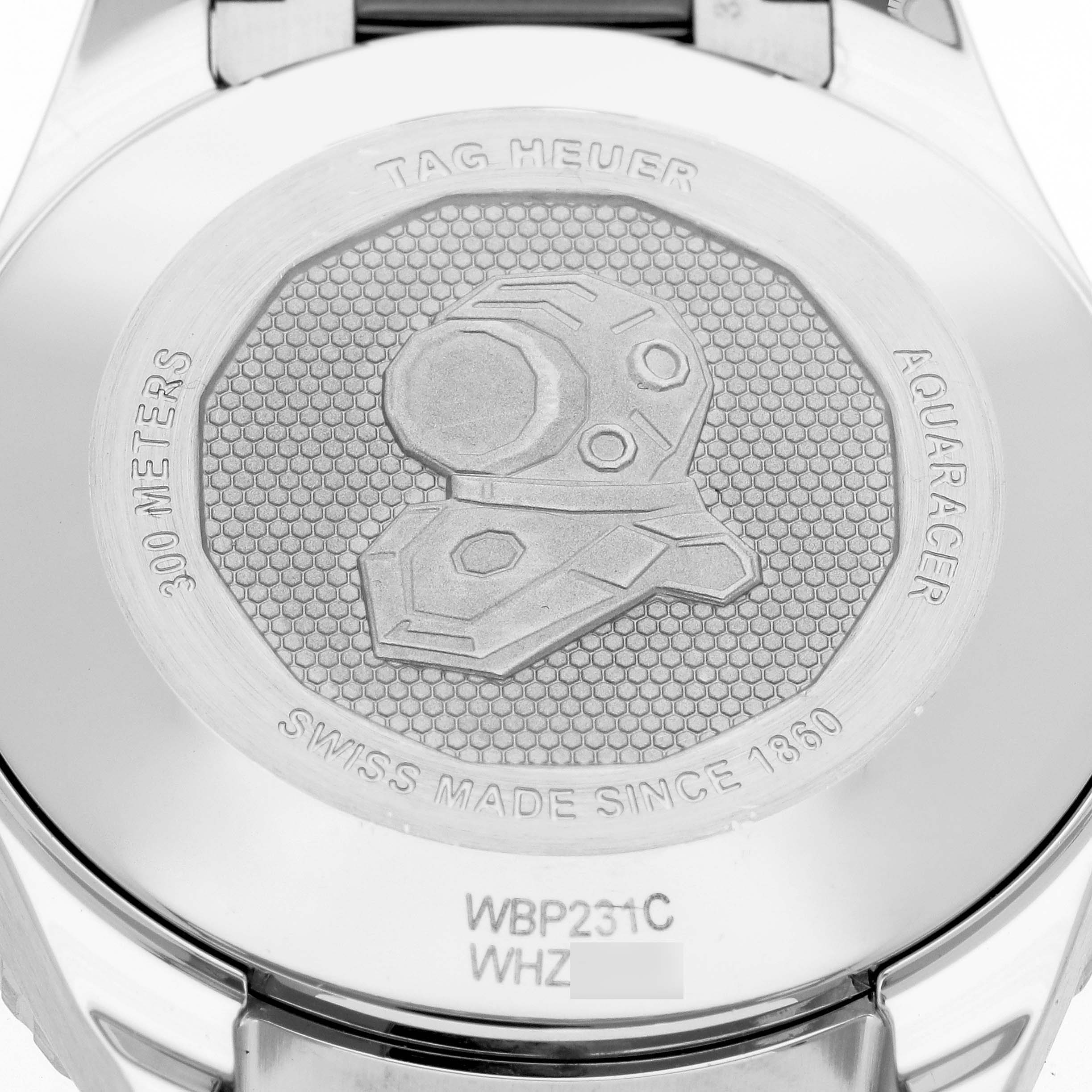 The image shows the back casing of a Tag Heuer Aquaracer WBP231C.BA0626 Women's Stainless Steel Silver Dial WBP231C.BA0626 Women's Stainless Steel Silver Dial watch, highlighting its engraved design and model details.
