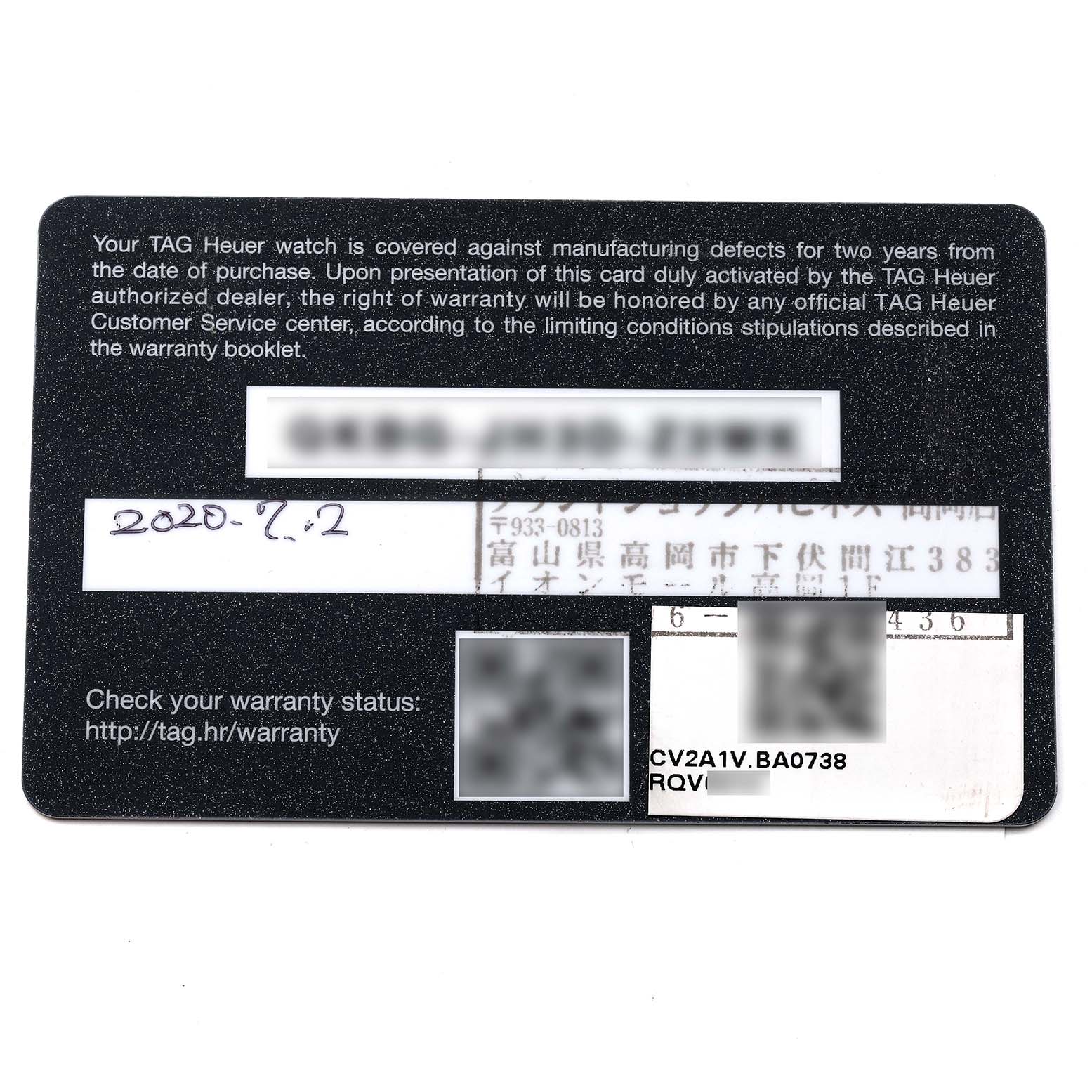 This is a warranty card for the Carrera model by Tag Heuer, showing warranty details and the purchase date.