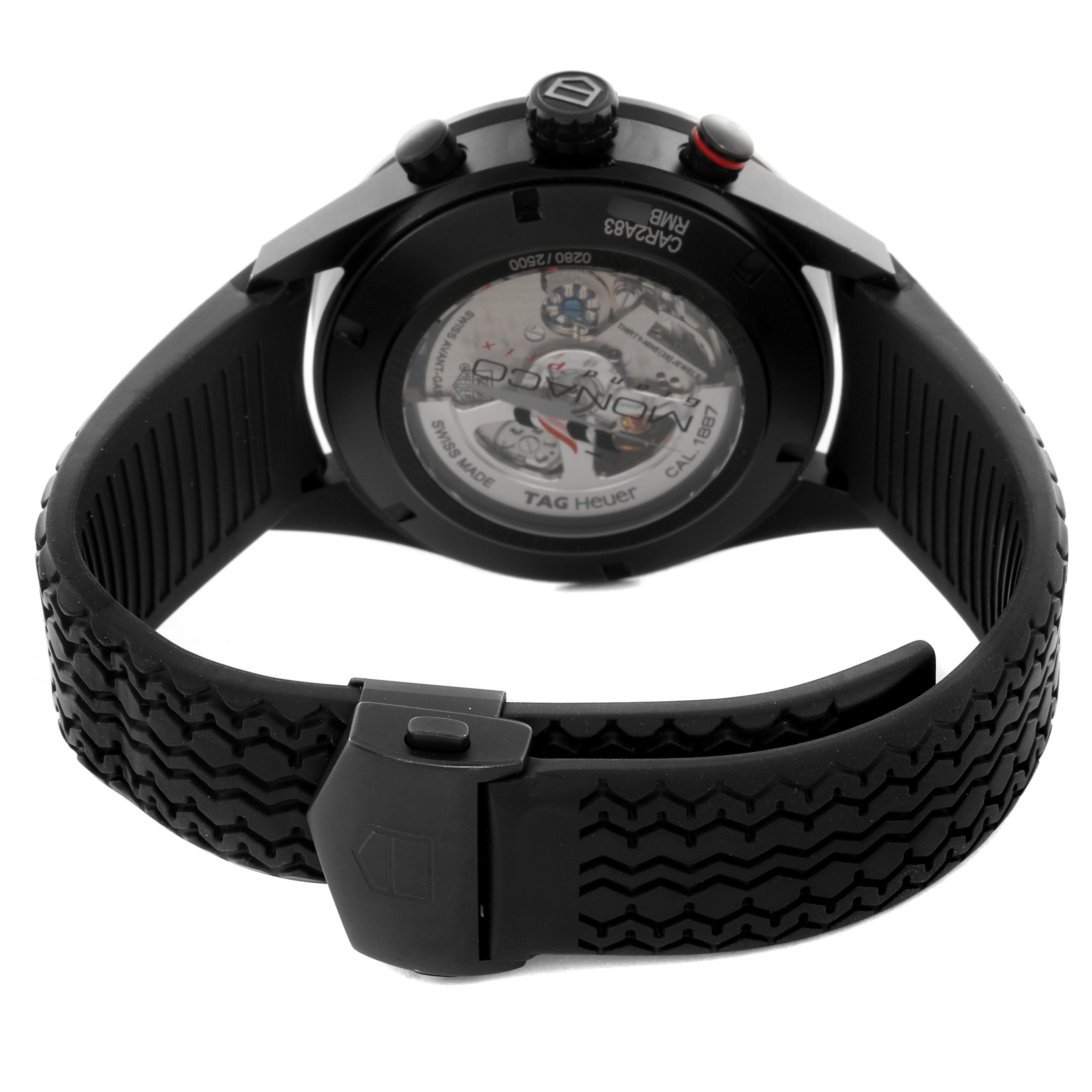 The Tag Heuer Carrera CAR2A83.FT6033 Men's Titanium Black Dial CAR2A83.FT6033 Men's Titanium Black Dial watch is shown from the rear, highlighting the transparent case back and black rubber strap.