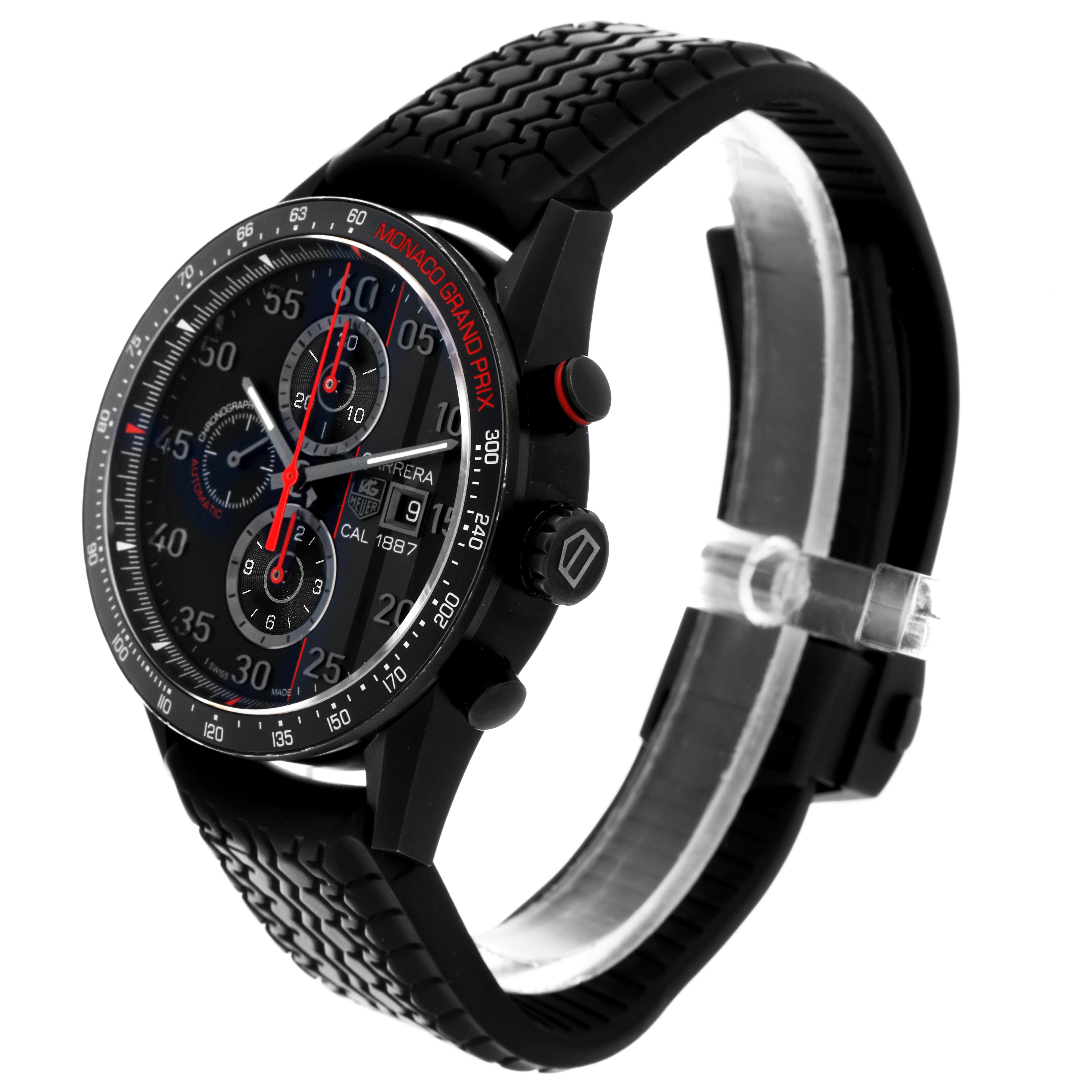 The Tag Heuer Carrera CAR2A83.FT6033 Men's Titanium Black Dial CAR2A83.FT6033 Men's Titanium Black Dial watch is shown at an angled side view, highlighting the face, bezel, pushers, and textured strap.