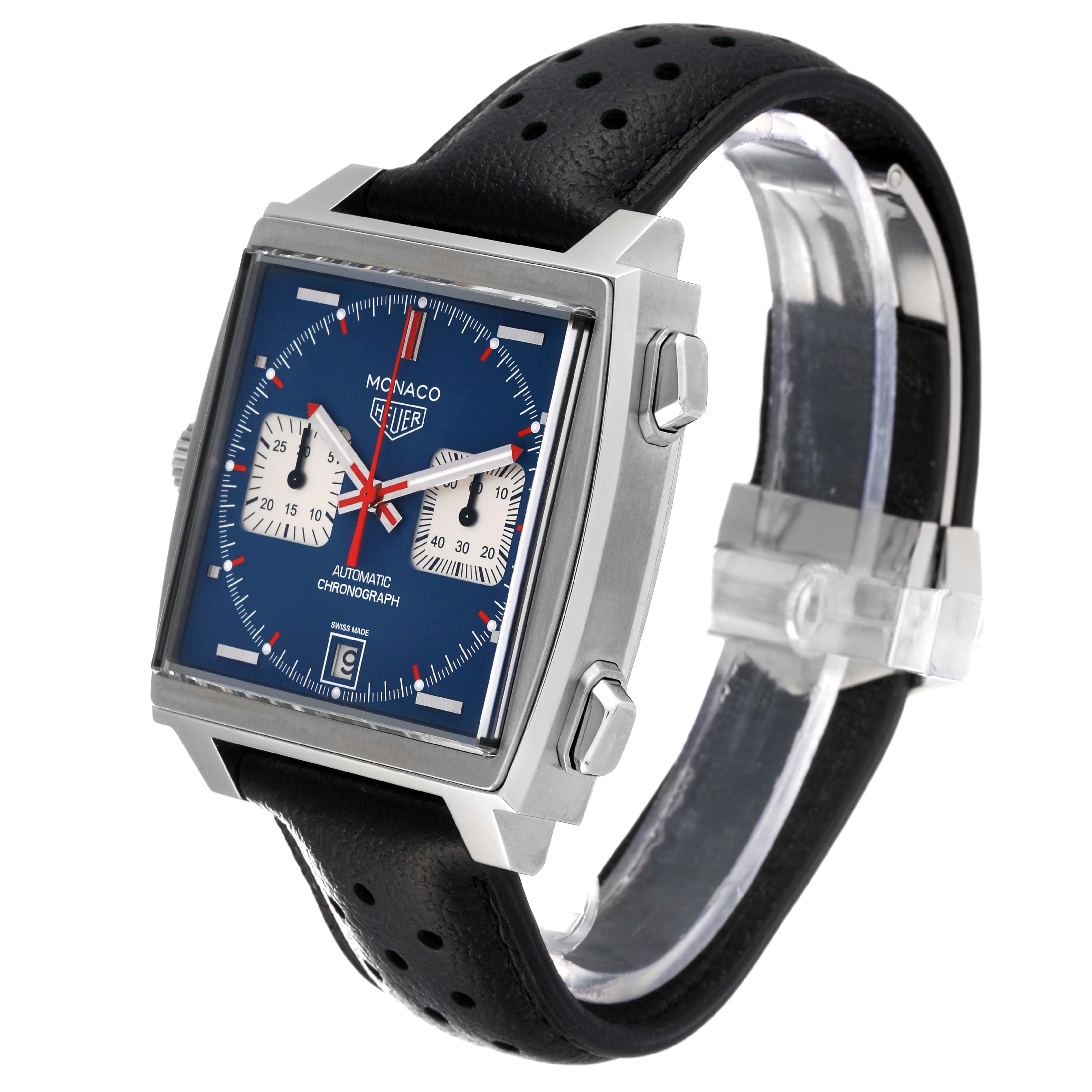 The Tag Heuer Monaco CAW211P.FC6356 Men's Stainless Steel Blue Dial CAW211P.FC6356 Men's Stainless Steel Blue Dial watch is shown at an angle revealing the face, bezel, pushers, and black perforated strap.