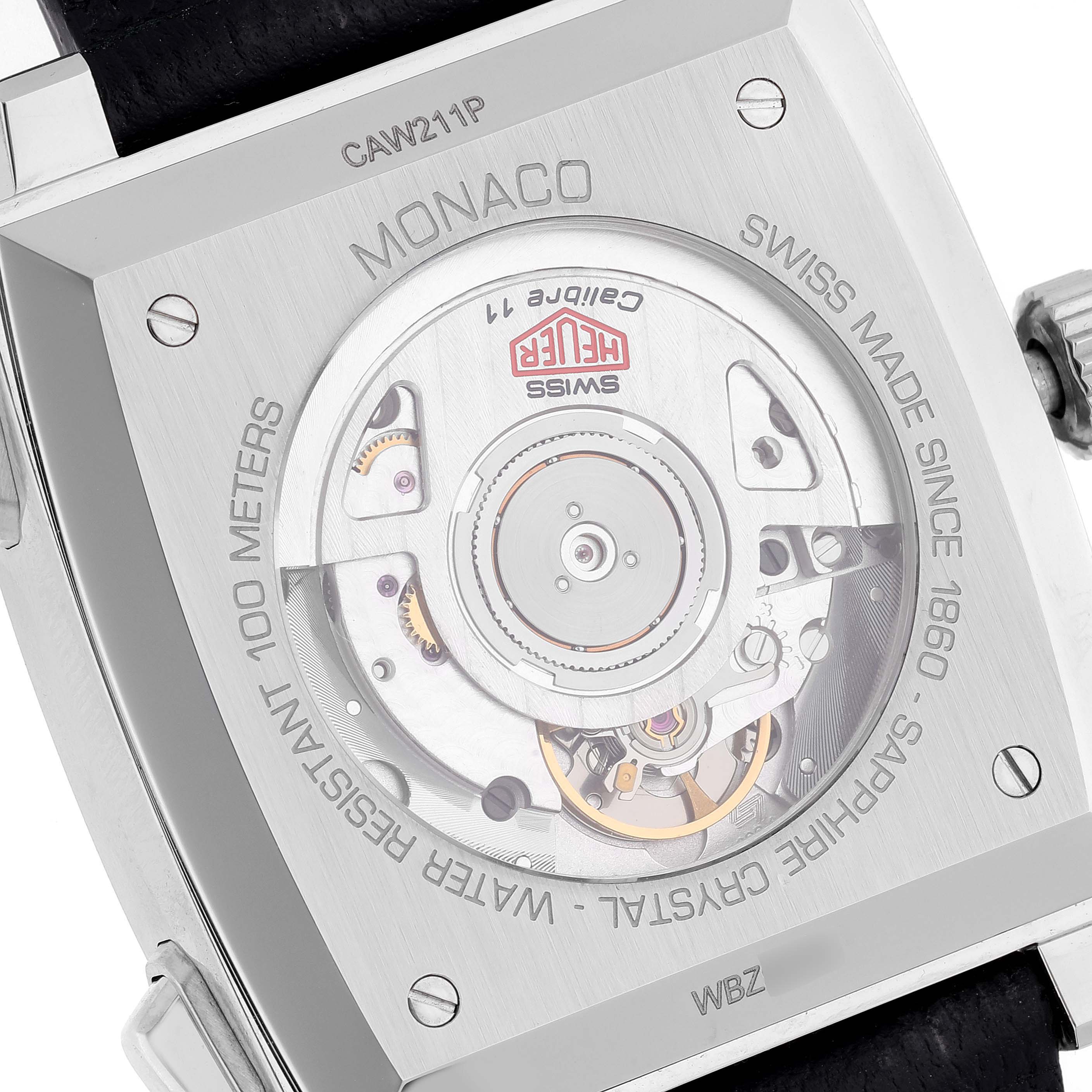 The image shows the back of the Tag Heuer Monaco CAW211P.FC6356 Men's Stainless Steel Blue Dial CAW211P.FC6356 Men's Stainless Steel Blue Dial watch, highlighting its automatic movement and case details.