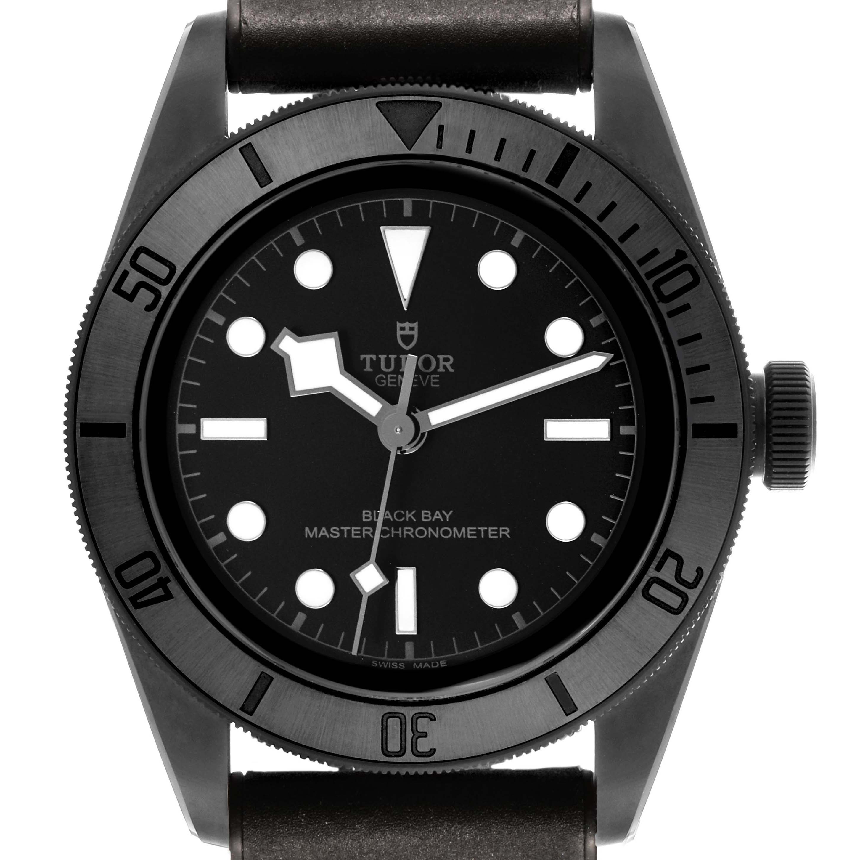 The Tudor Heritage Black Bay 79210 Men's Ceramic Black Dial watch is shown from the front, highlighting the dial, bezel, and strap.