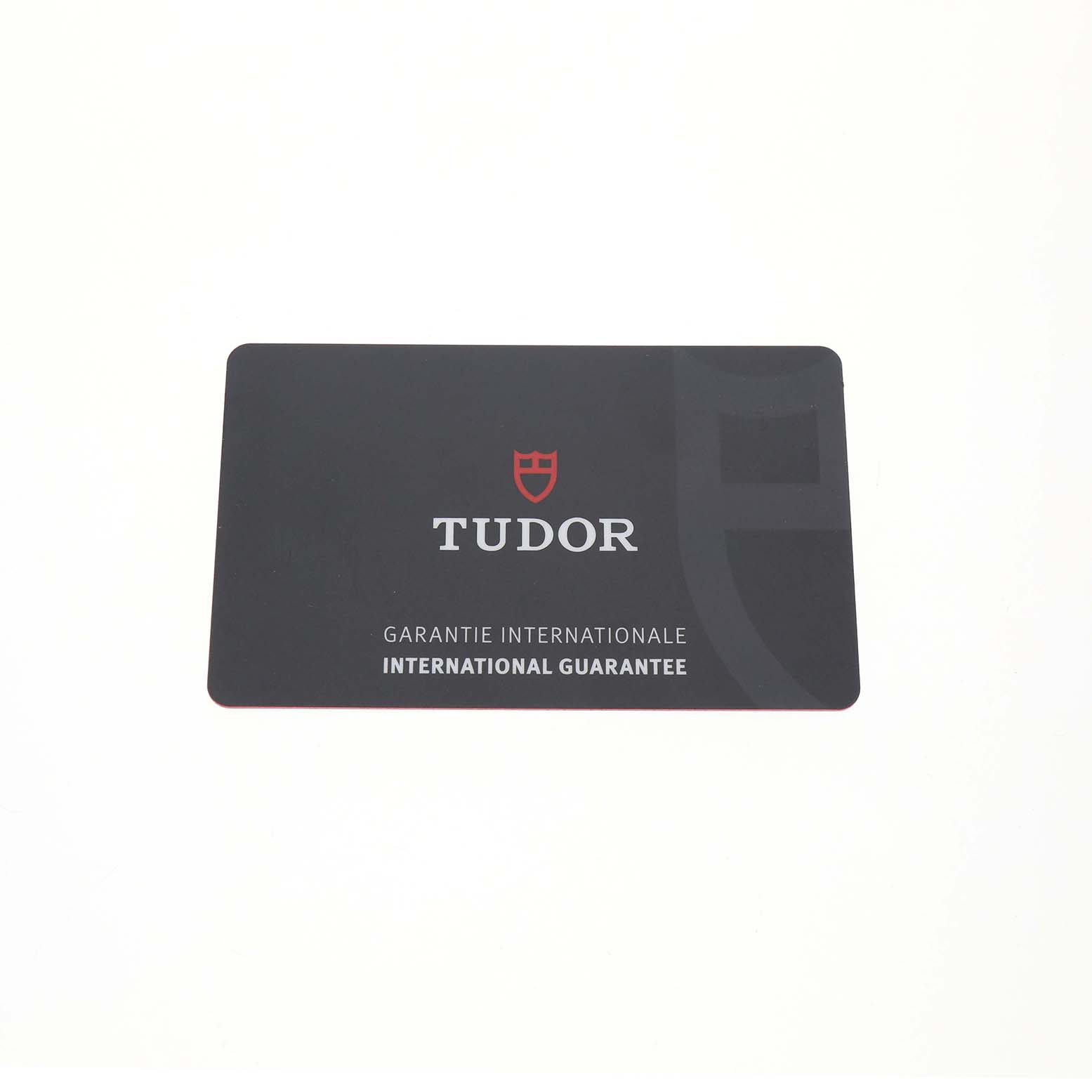 The image shows an International Guarantee card for the Tudor Heritage Black Bay 79210 Men's Ceramic Black Dial watch.