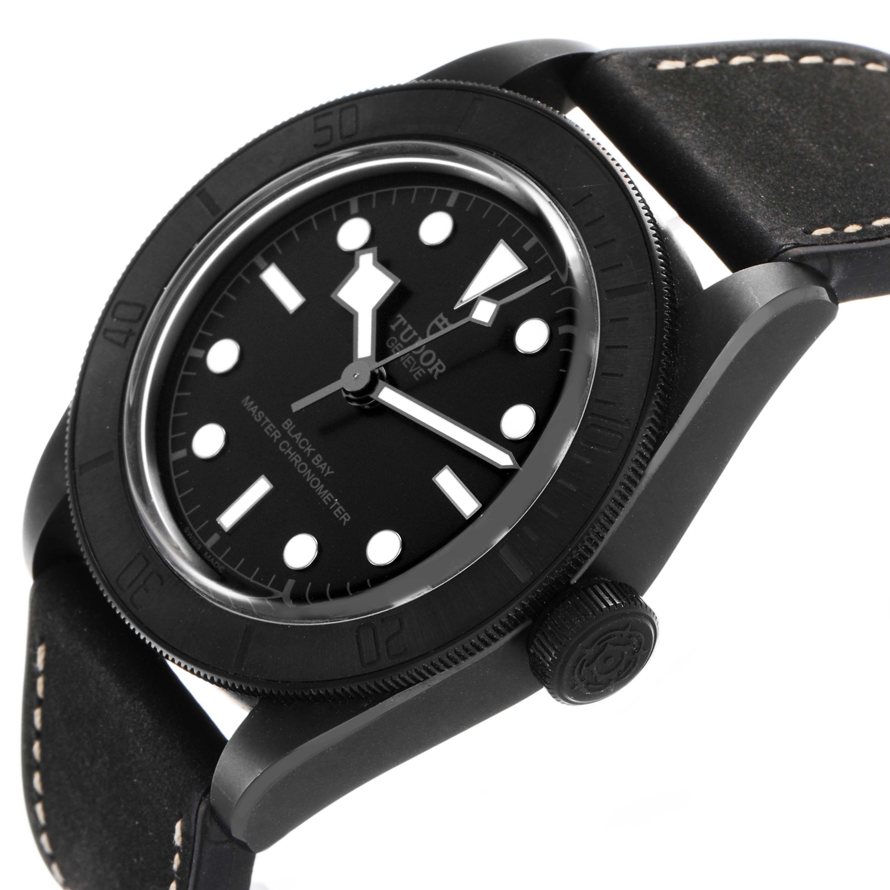 The Tudor Heritage Black Bay 79210 Men's Ceramic Black Dial watch is shown at a slight side angle, highlighting the bezel, dial, and strap.
