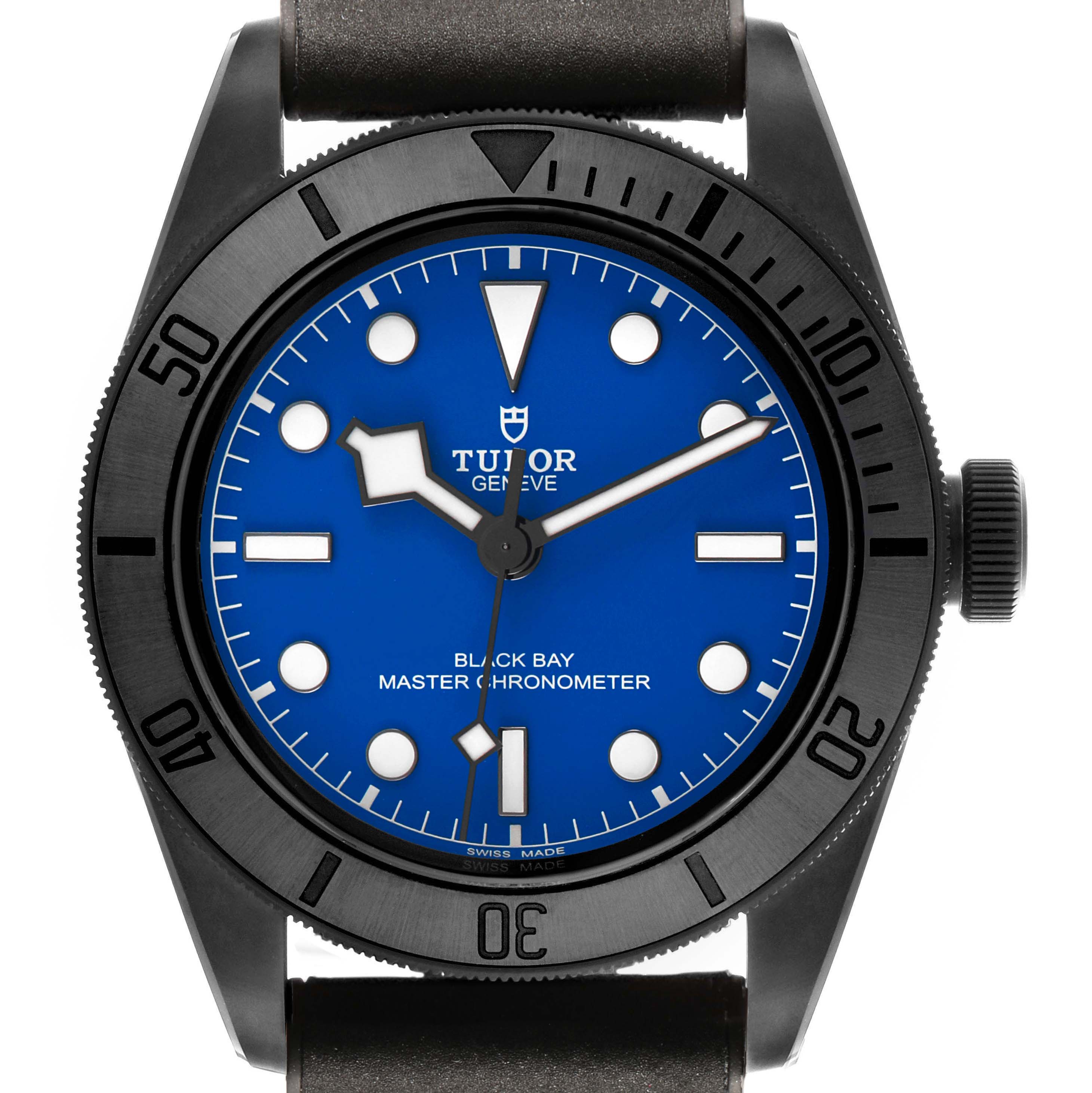 The Tudor Heritage Black Bay 79210 Men's Ceramic Blue Dial watch is shown from the front, highlighting its blue dial, bezel, and crown.