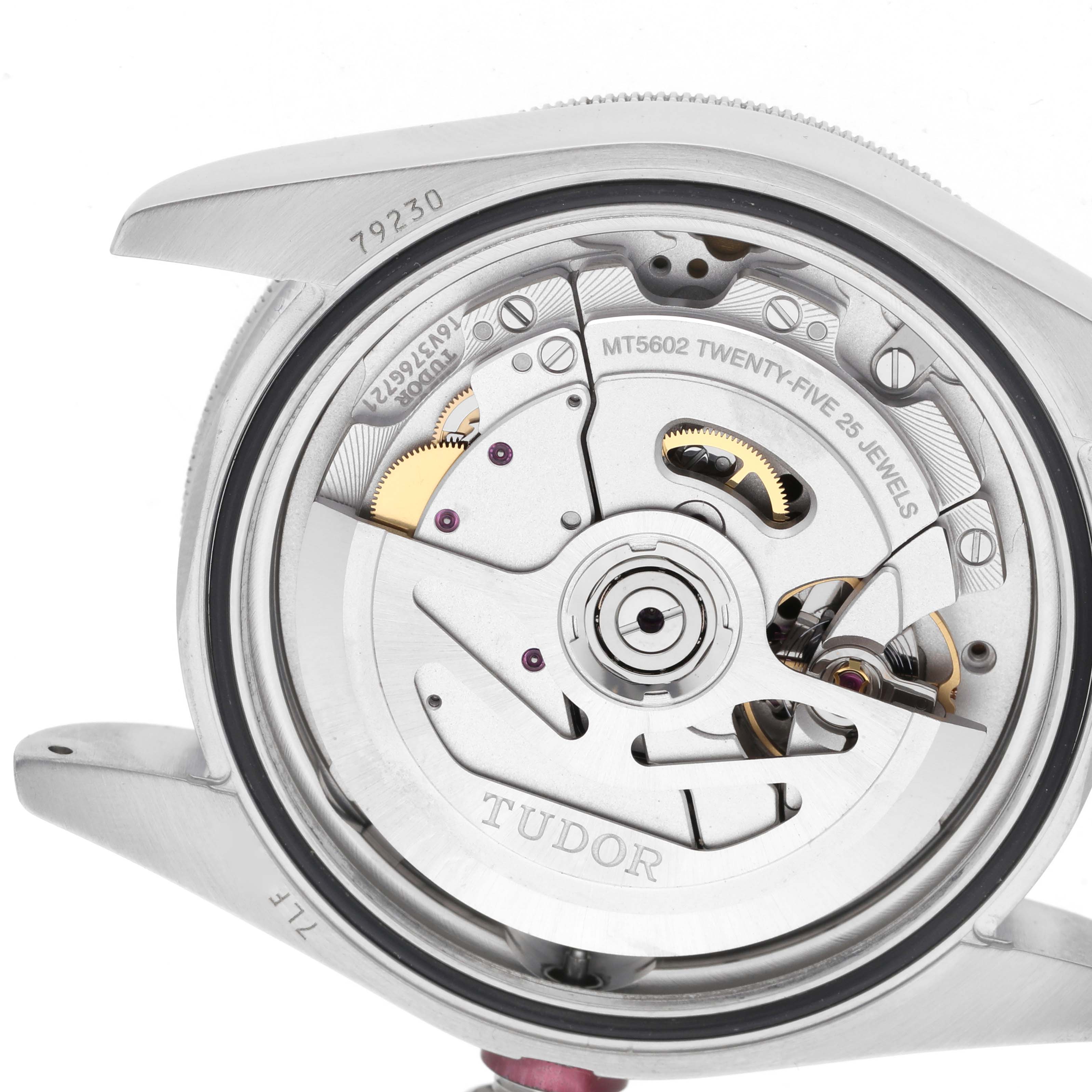 The Tudor Heritage Black Bay 79230R Men's Stainless Steel Black Dial 79230R Men's Stainless Steel Black Dial watch is shown from the back displaying its movement and rotor.