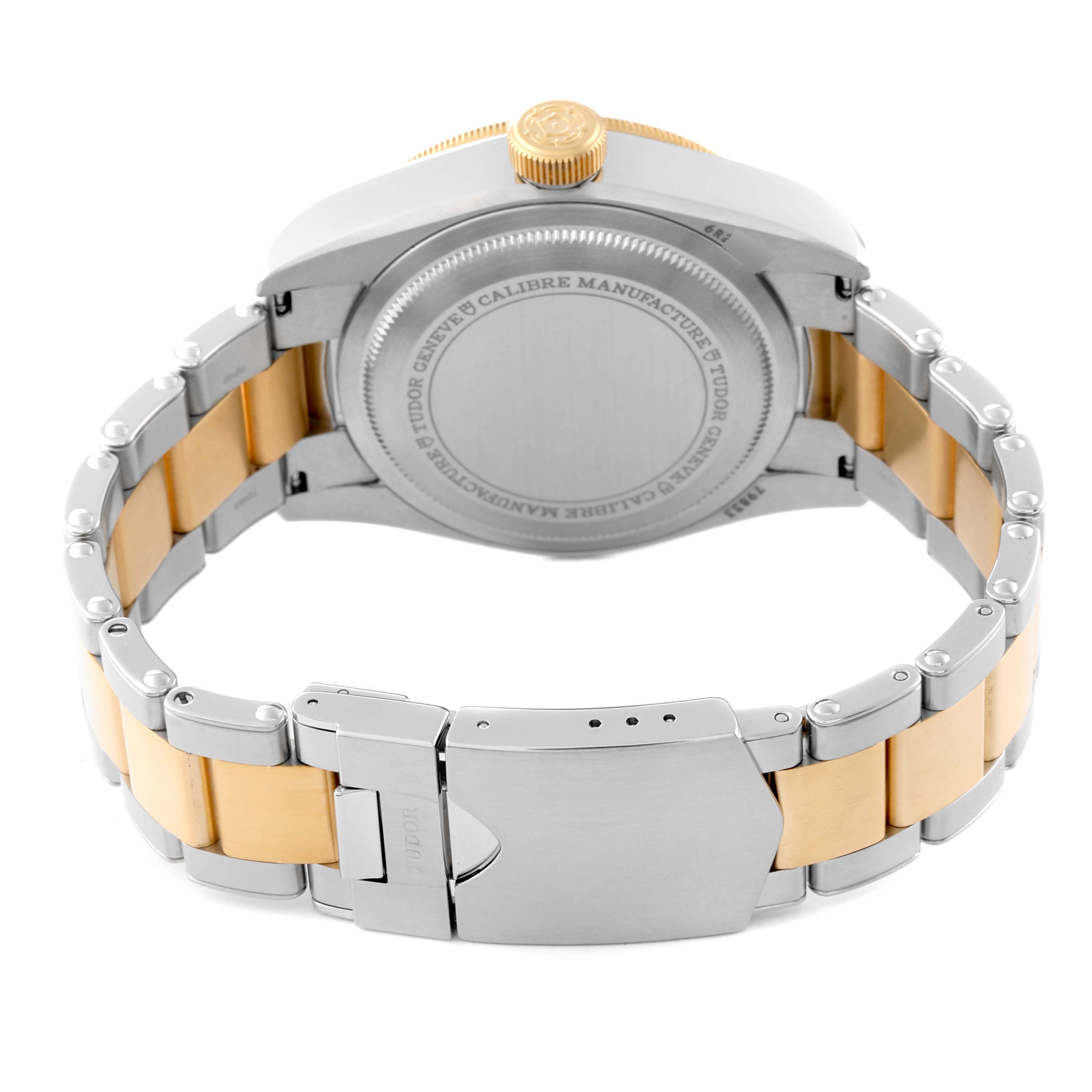 This image shows the back case and bracelet of a Tudor Heritage Black Bay 79833MN Men's Steel and Gold (two tone) Black Dial 79833MN Men's Steel and Gold (two tone) Black Dial watch.