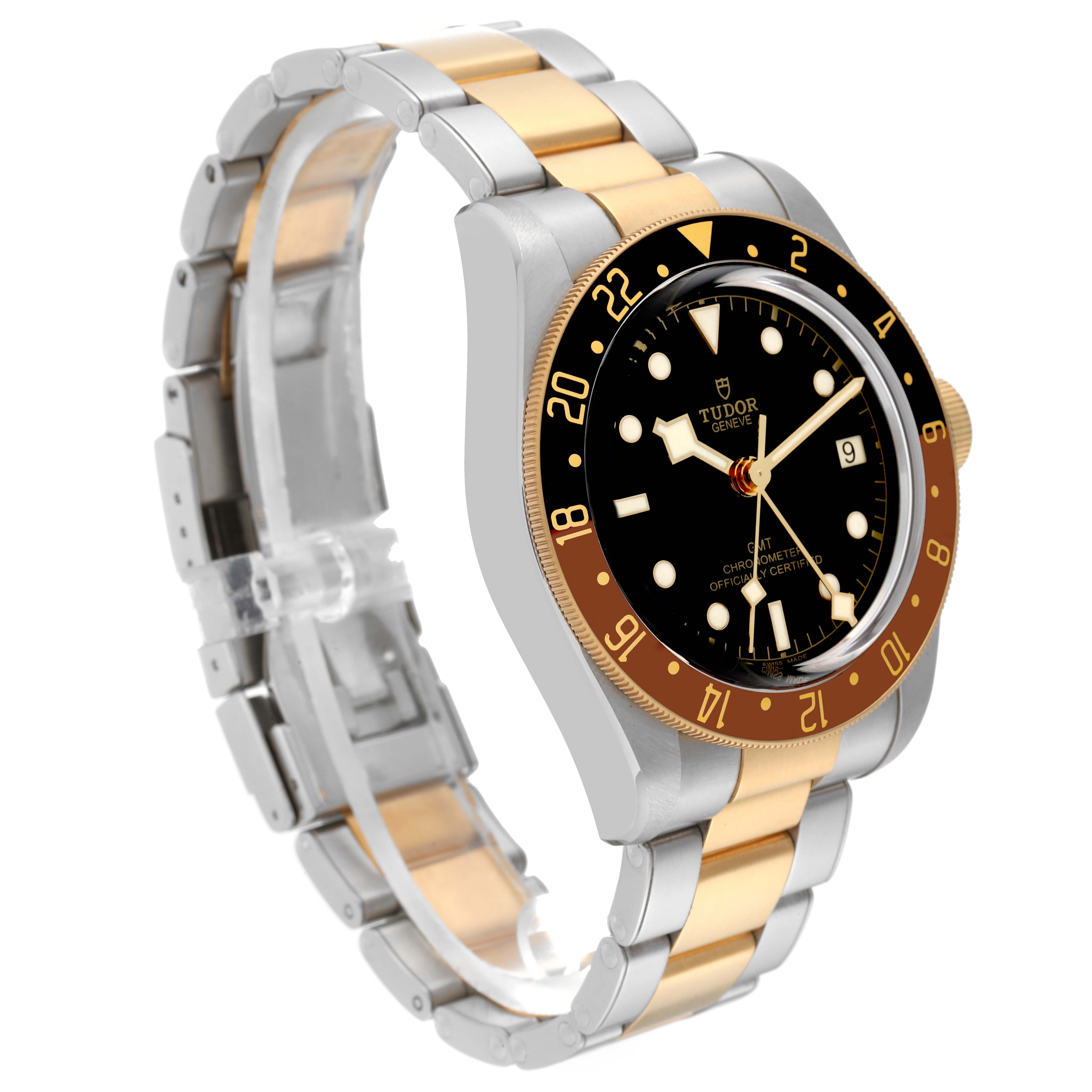 The Tudor Heritage Black Bay 79833MN Men's Steel and Gold (two tone) Black Dial 79833MN Men's Steel and Gold (two tone) Black Dial model watch is shown at an angle showcasing its face, bezel, crown, and two-tone bracelet.