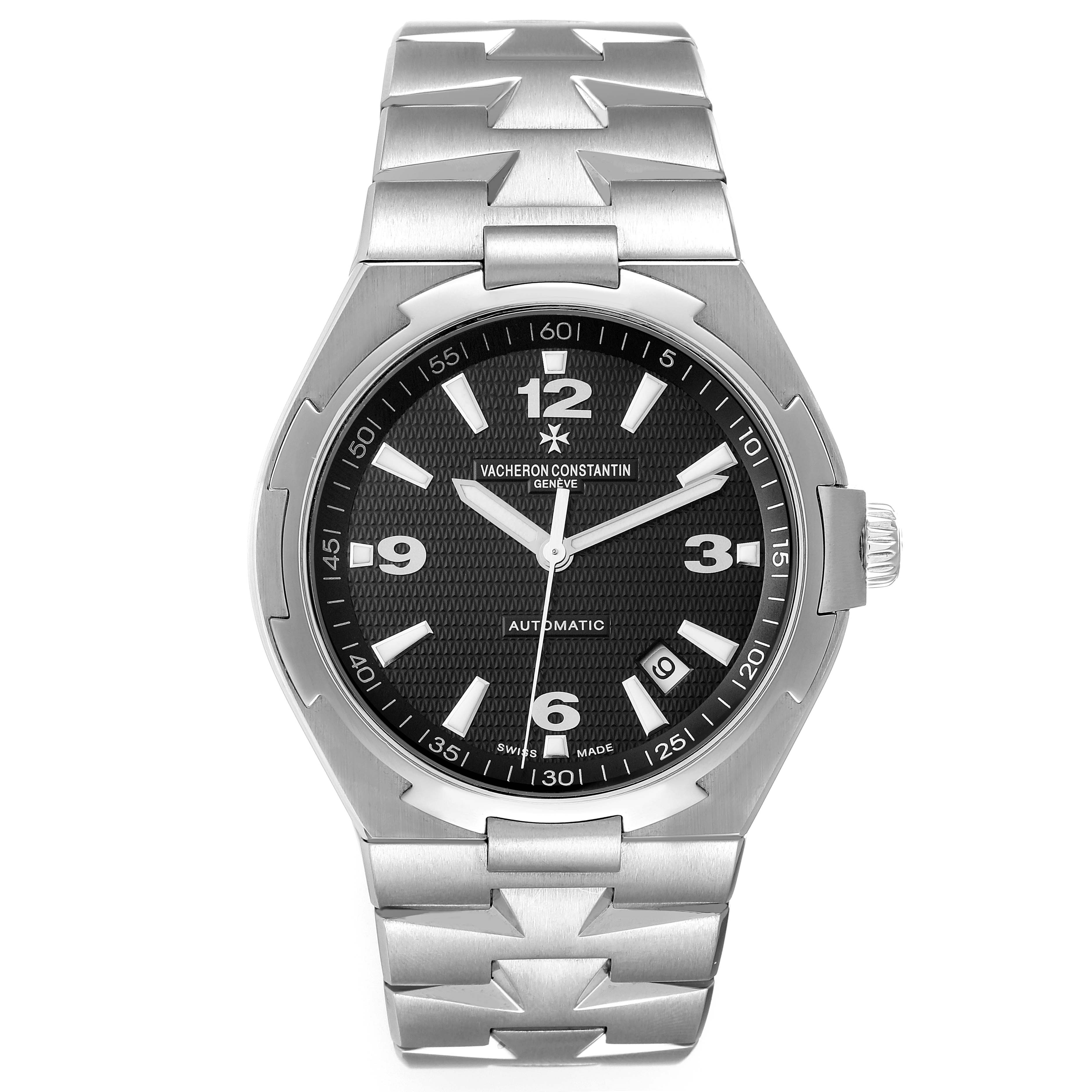 The image shows a front view of a Vacheron Constantin Overseas 47040/B01A-9094 Men's Stainless Steel Black Dial 47040/B01A-9094 Men's Stainless Steel Black Dial model watch, displaying its face and stainless steel bracelet.