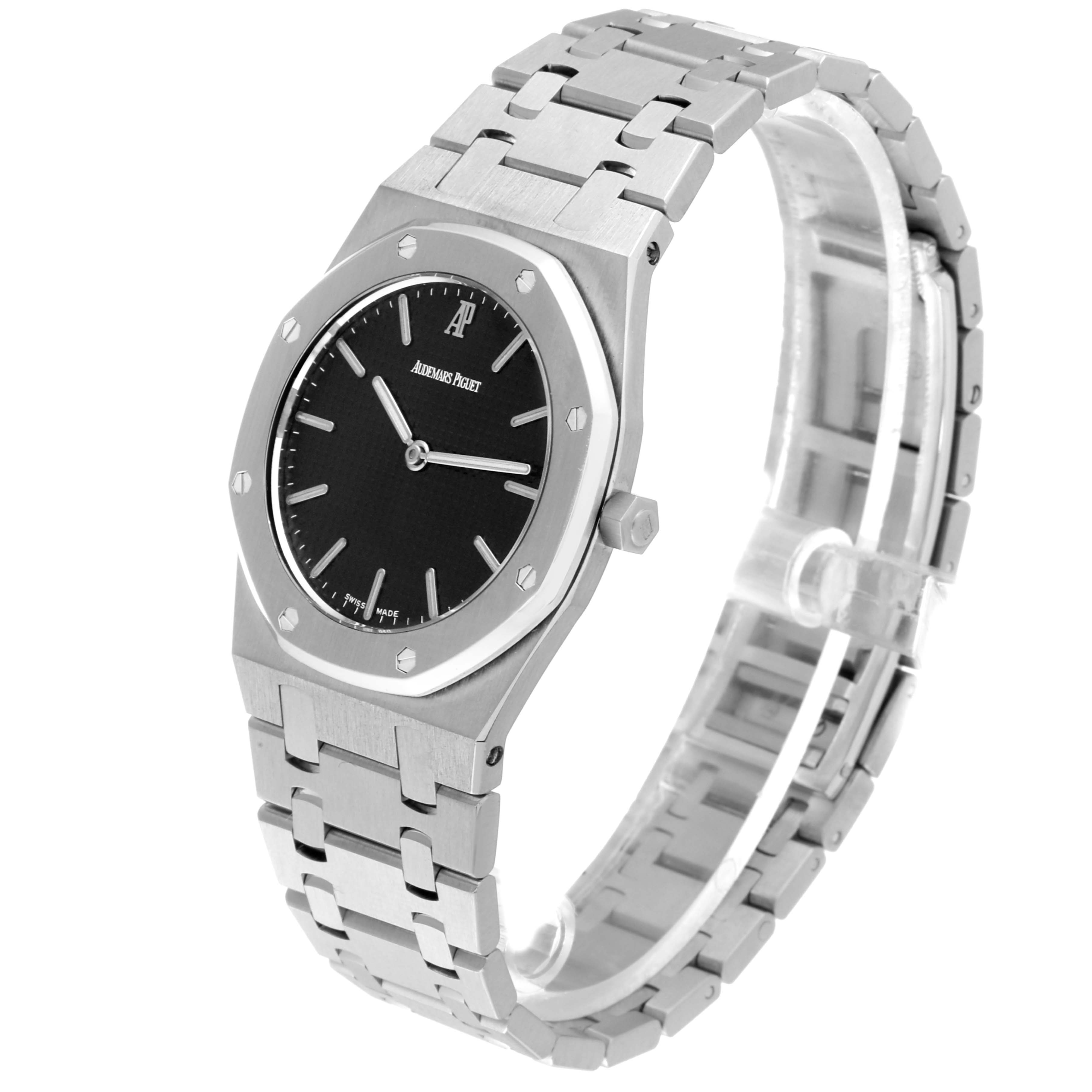 This image shows an angled view of the Royal Oak by Audemars Piguet, highlighting the watch face, bezel, and bracelet.