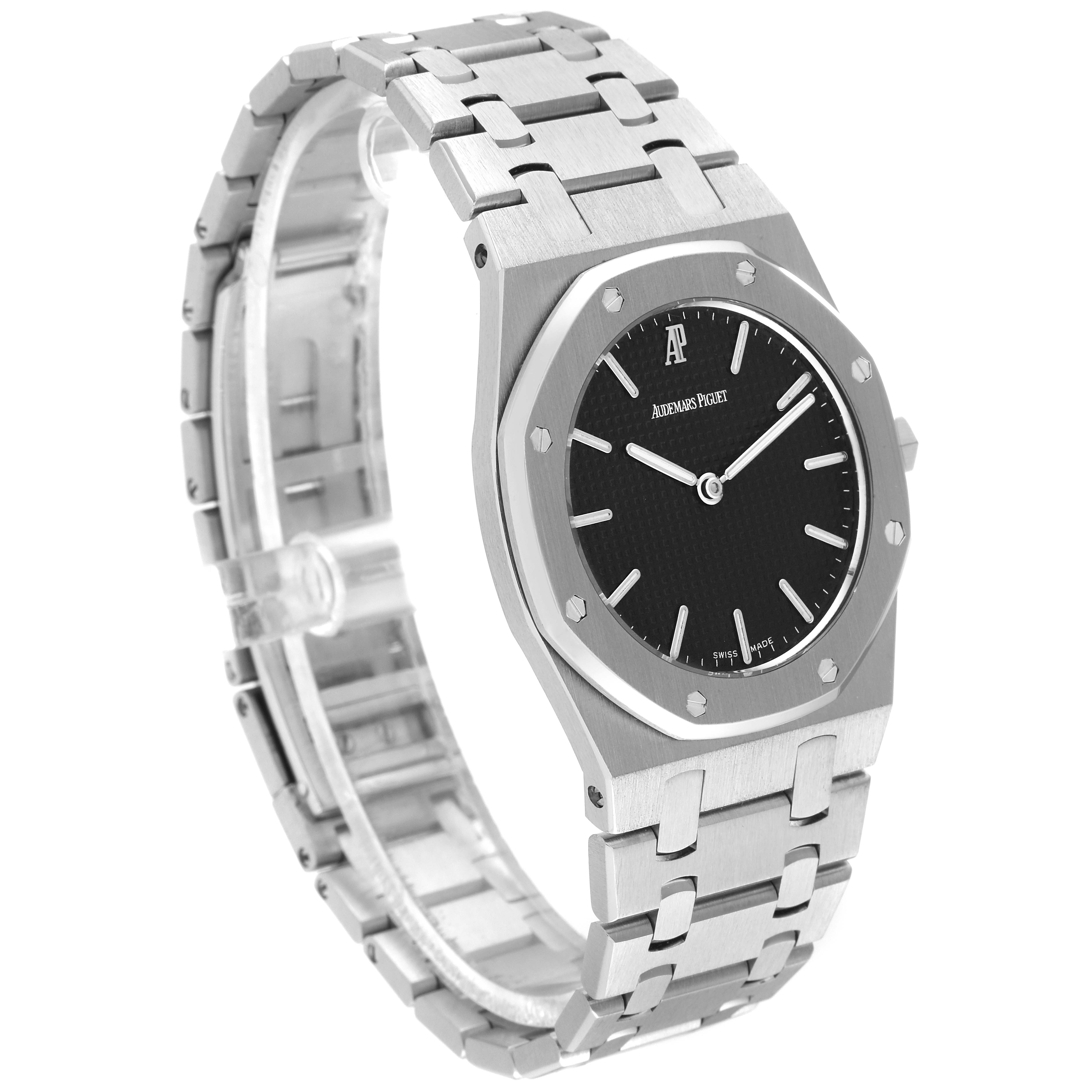 The image shows a Royal Oak model by Audemars Piguet from a side angle, highlighting its bracelet and face.