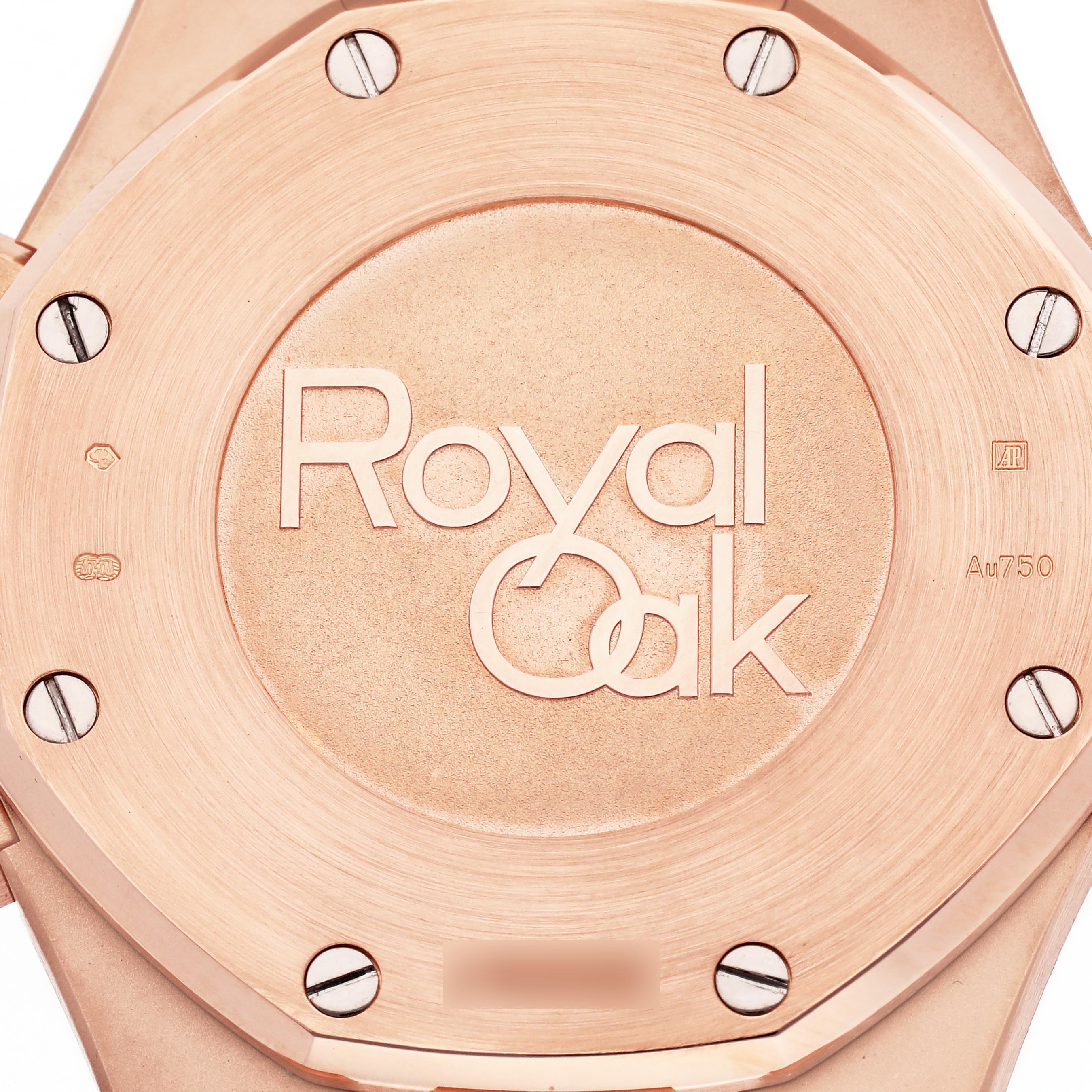 The image shows the back case of an Audemars Piguet Royal Oak 26331OR.OO.1220OR.02 Men's Rose Gold Brown Dial 26331OR.OO.1220OR.02 Men's Rose Gold Brown Dial, highlighting the brand and model name engravings.