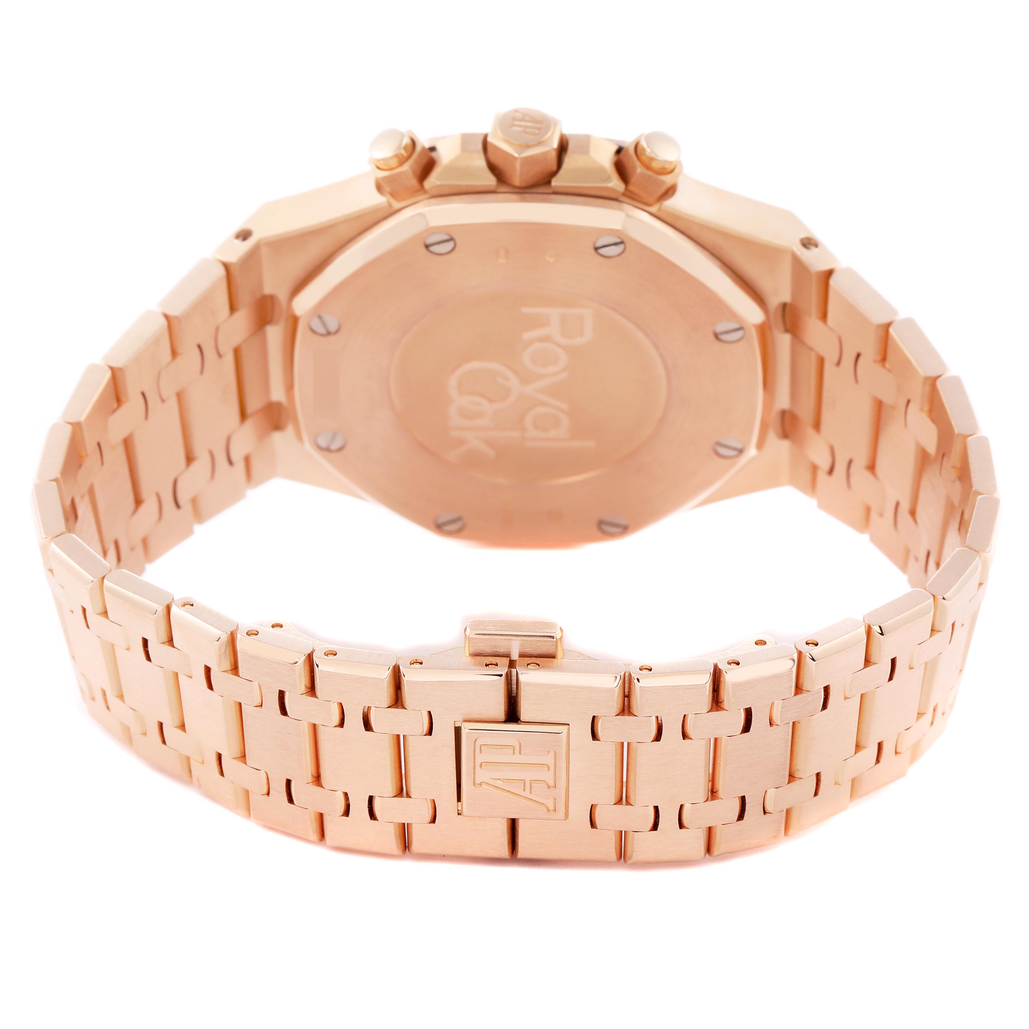 The image shows the back and clasp of a Royal Oak by Audemars Piguet, highlighting its bracelet and engraved logo.