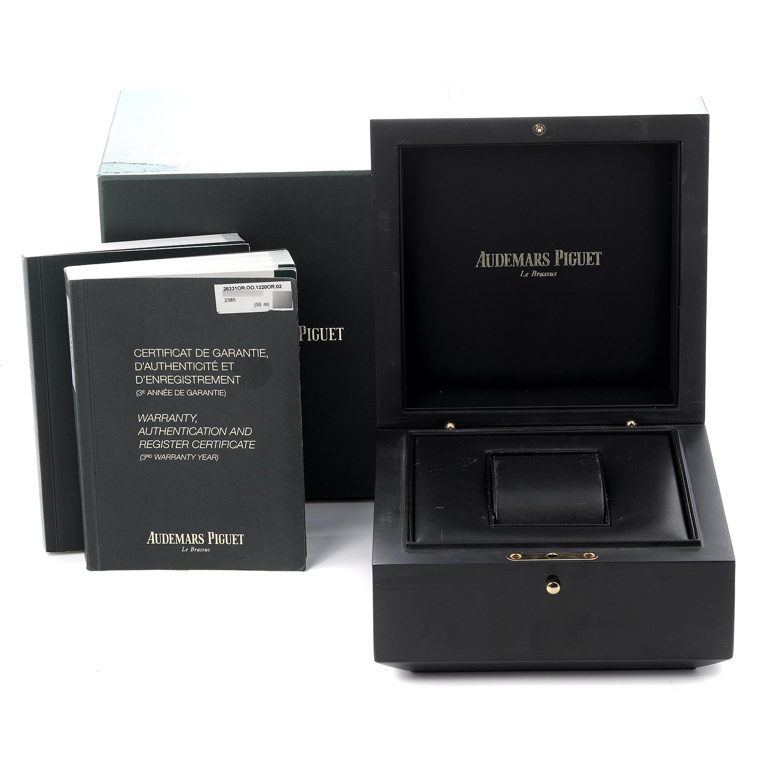 The image shows an Audemars Piguet Royal Oak 26331OR.OO.1220OR.02 Men's Rose Gold Brown Dial 26331OR.OO.1220OR.02 Men's Rose Gold Brown Dial watch box and warranty booklets from a front angle.