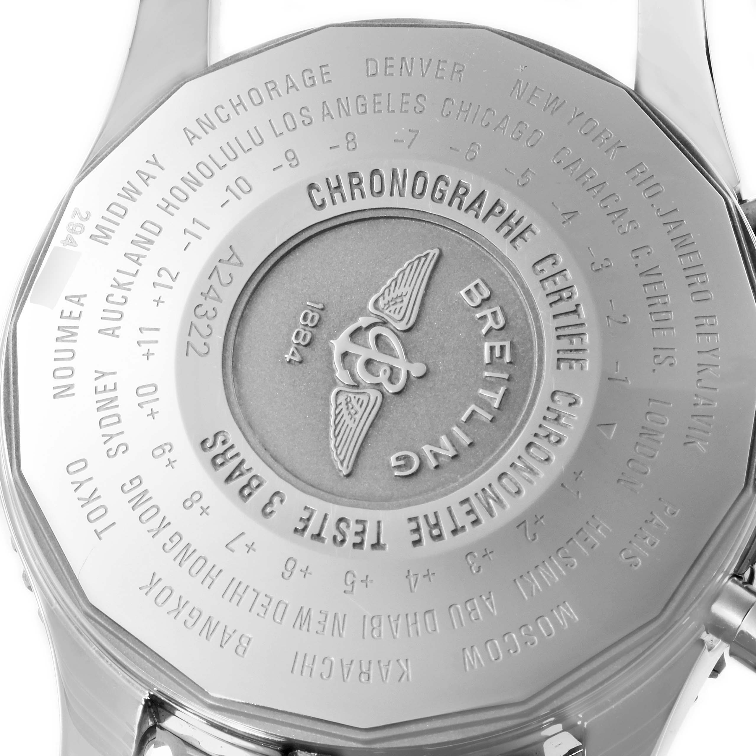 The image shows the back case of the Breitling Navitimer A24322 Men
s Stainless Steel Silver Dial A24322 Men
s Stainless Steel Silver Dial watch, displaying its engraving and world time zone markers.
