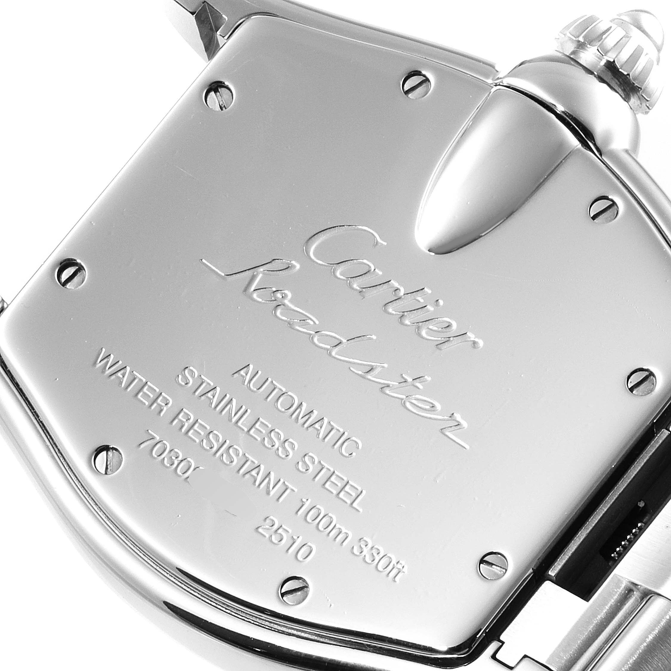 The image shows the back case of a Cartier Roadster W62001V3 Men's Stainless Steel Grey Dial W62001V3 Men's Stainless Steel Grey Dial watch, highlighting the engravings and the crown.