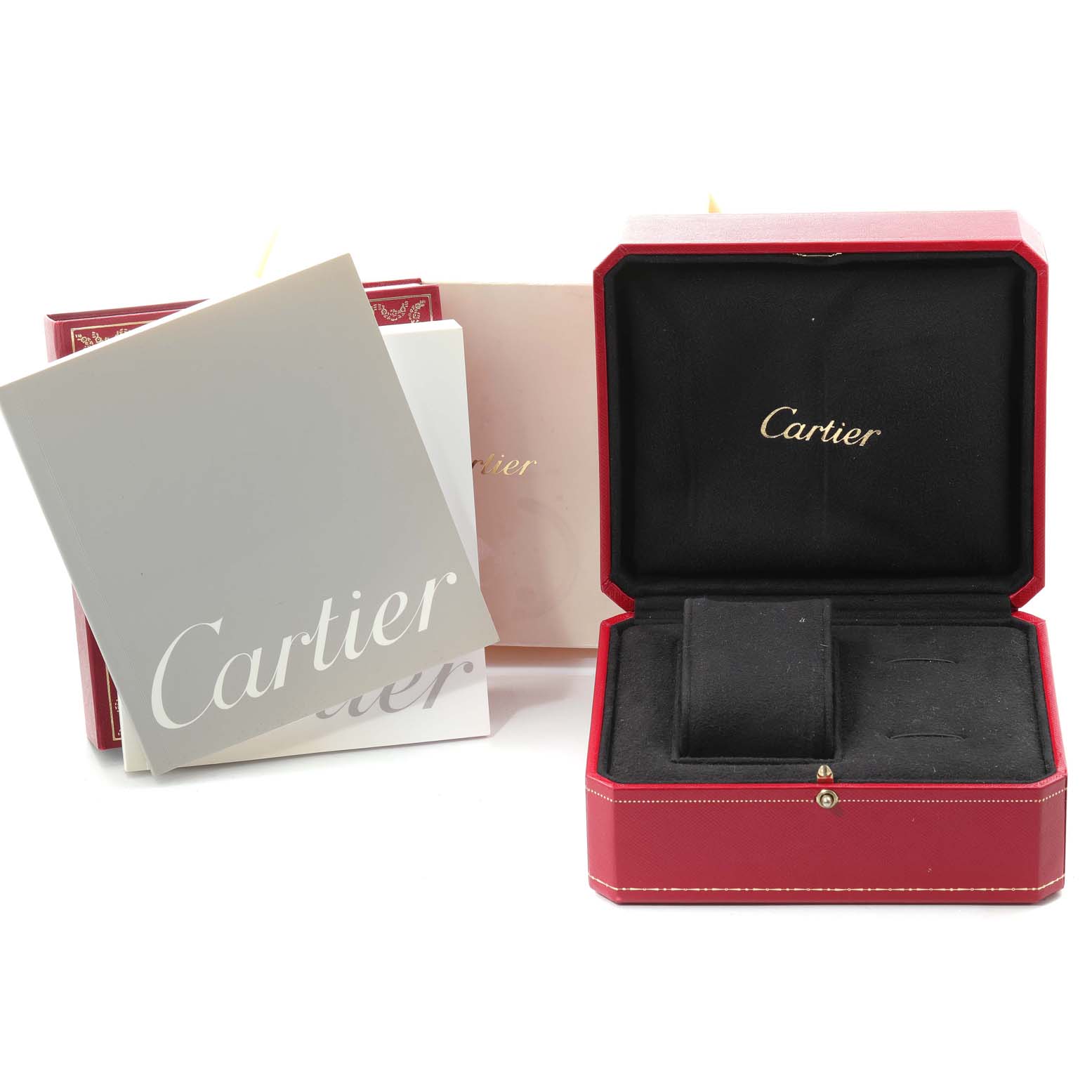 The image shows the open box and documentation for the Cartier Roadster W62017V3 Women's Stainless Steel Pink Dial W62017V3 Women's Stainless Steel Pink Dial watch.