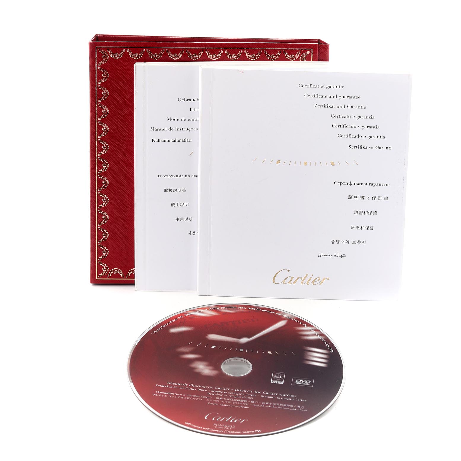 The image shows the packaging, manuals, and a disc for the Cartier Tank Louis W1529856 Women's Yellow Gold Silver Dial W1529856 Women's Yellow Gold Silver Dial watch.