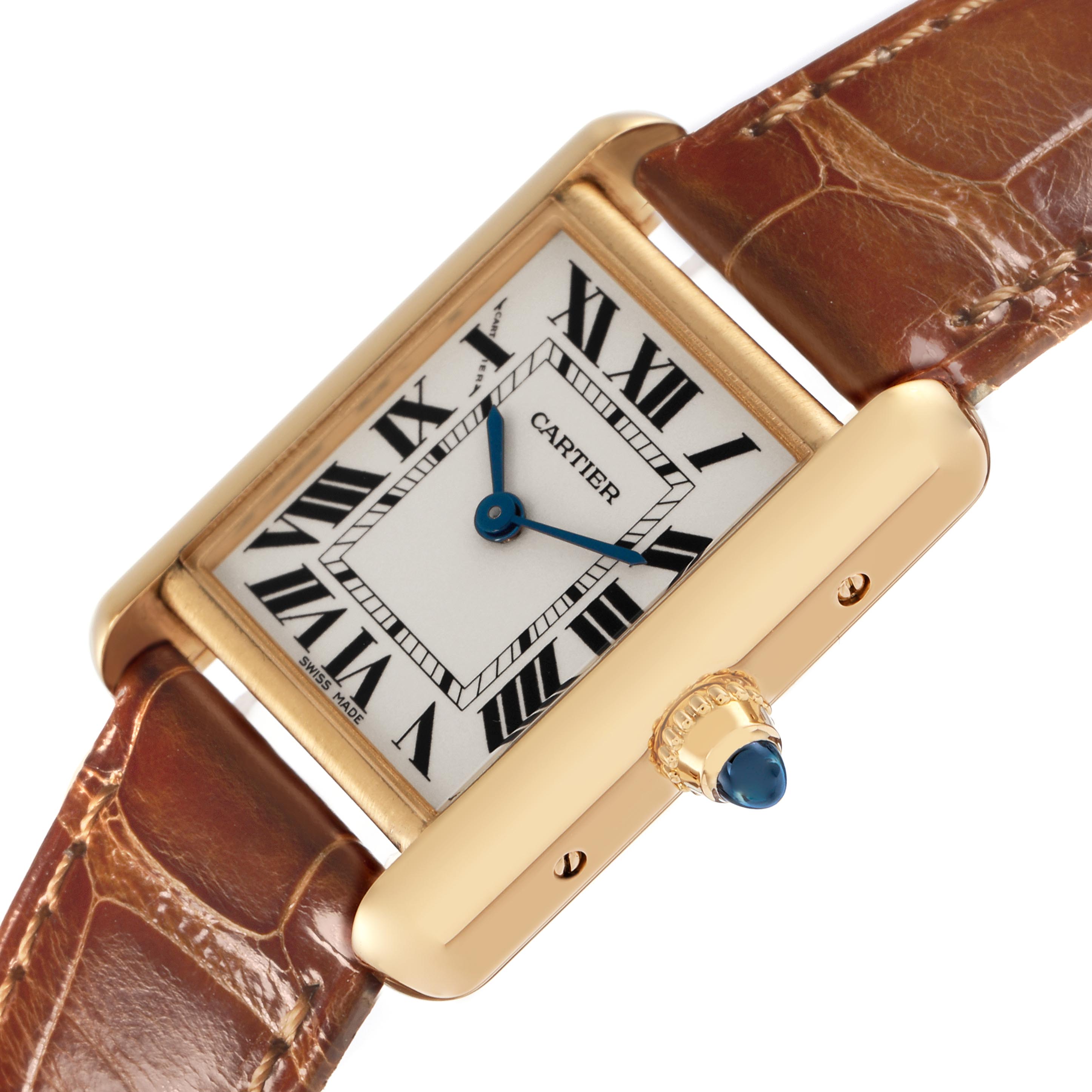 The Cartier Tank Louis W1529856 Women's Yellow Gold Silver Dial W1529856 Women's Yellow Gold Silver Dial watch is shown at an angle highlighting the face, Roman numerals, crown, and leather strap.