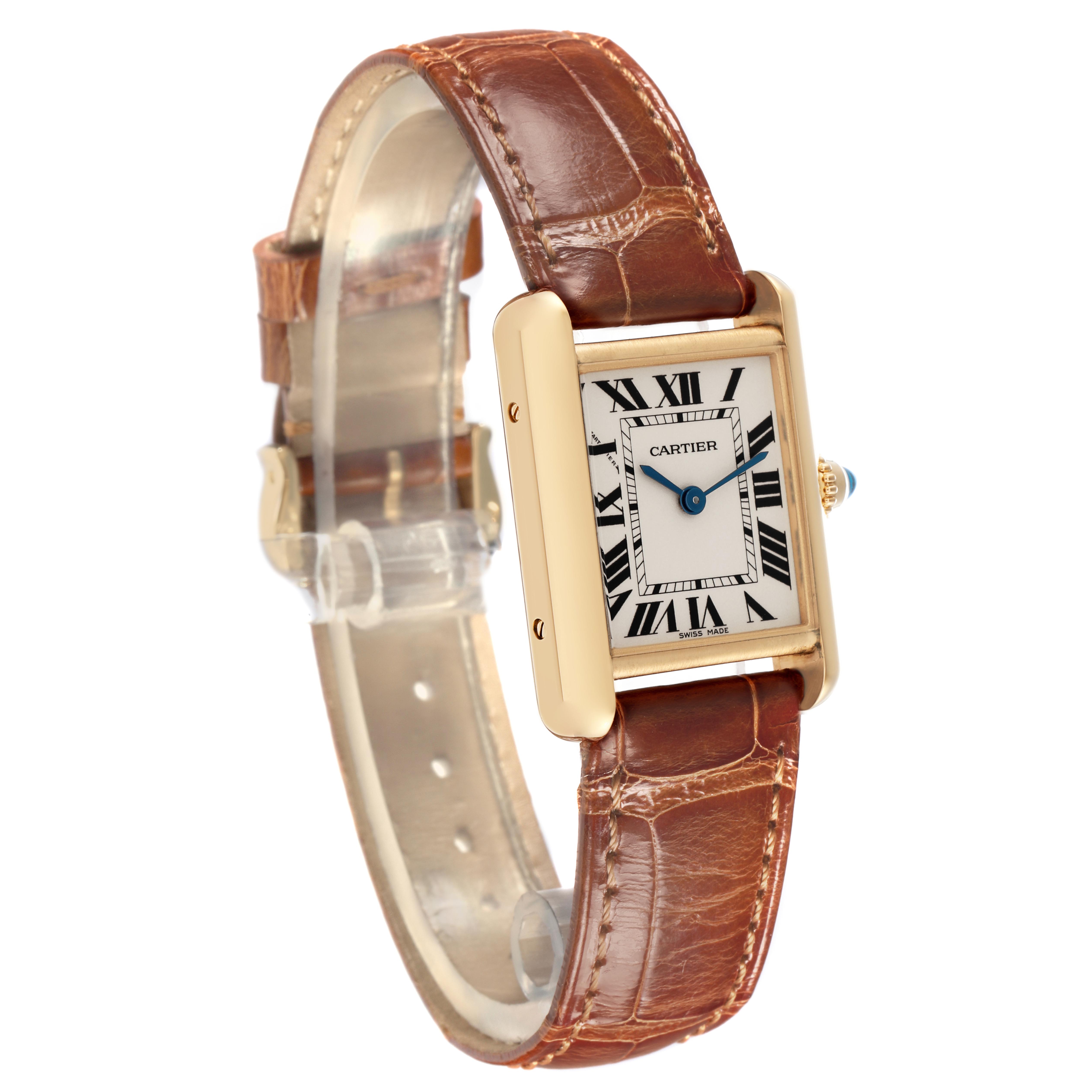 The Tank Louis by Cartier is shown at an angled side view, displaying the leather strap, rectangular case, and Roman numeral dial.