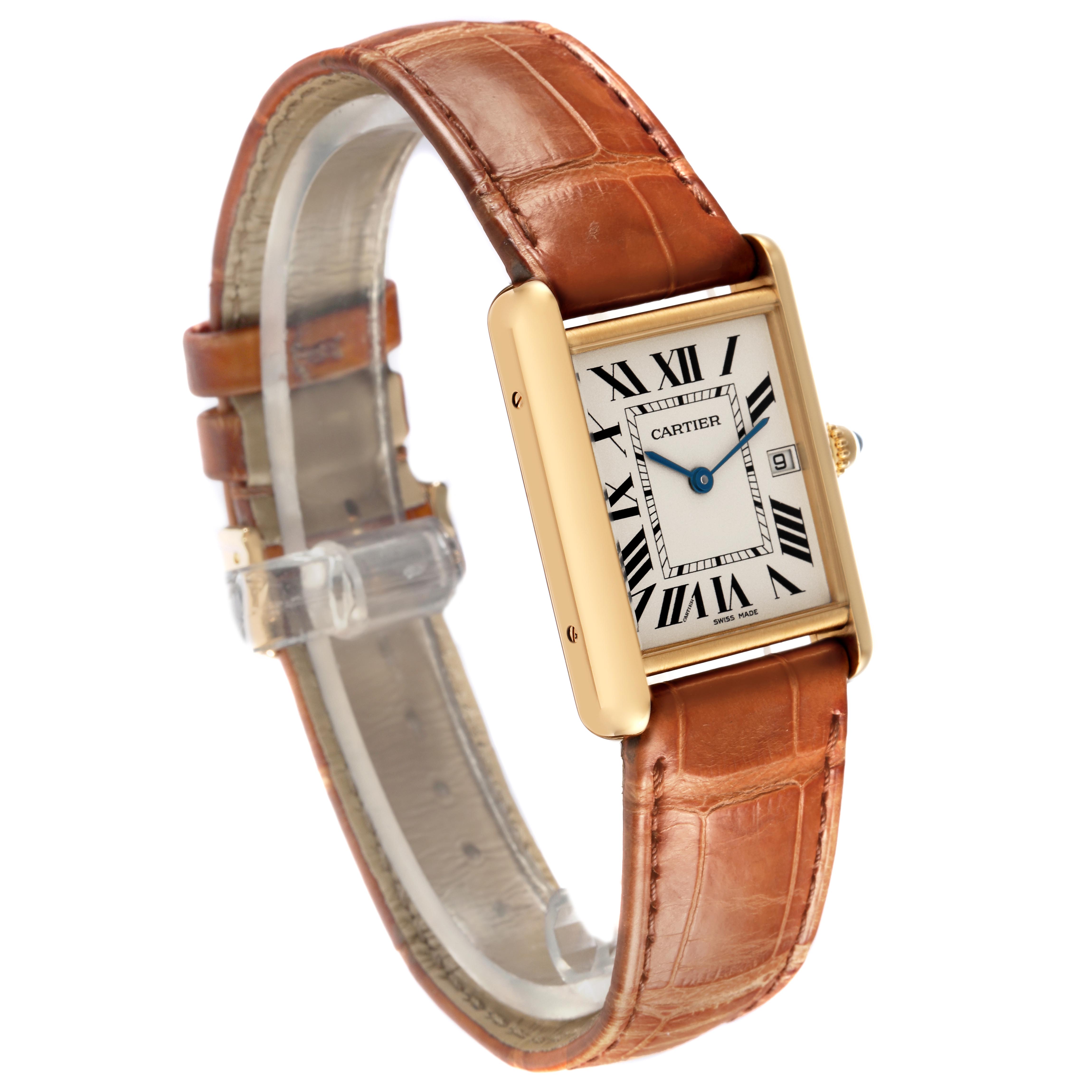 The Cartier Tank Louis W1529756 Men's Yellow Gold Silver Dial W1529756 Men's Yellow Gold Silver Dial watch is shown at an angle displaying its rectangular face, leather strap, and side view of the case.