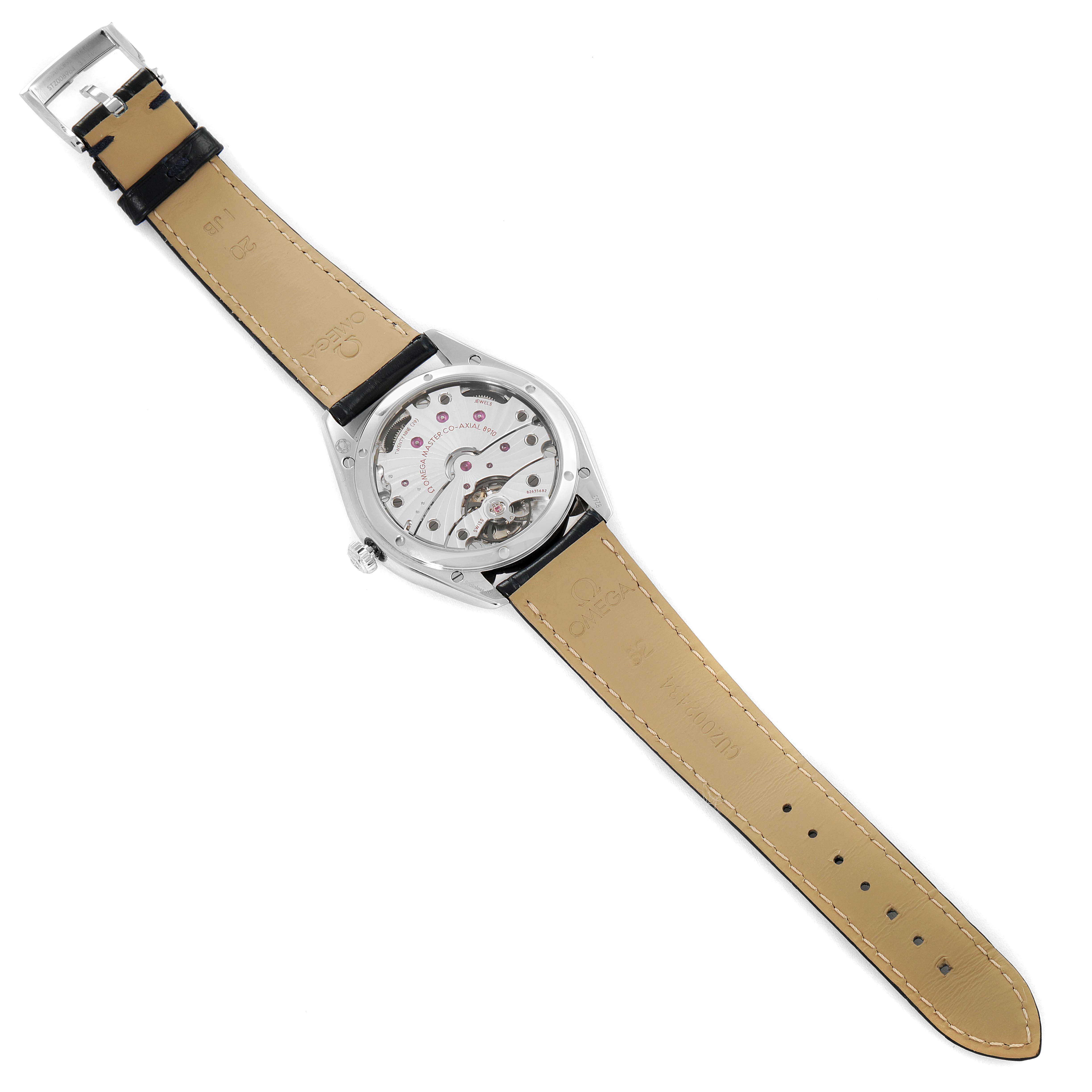 The image shows the back of an Omega De Ville 435.13.40.21.03.001 Men's Stainless Steel Blue Dial 435.13.40.21.03.001 Men's Stainless Steel Blue Dial watch, highlighting its mechanical movement and beige leather strap.