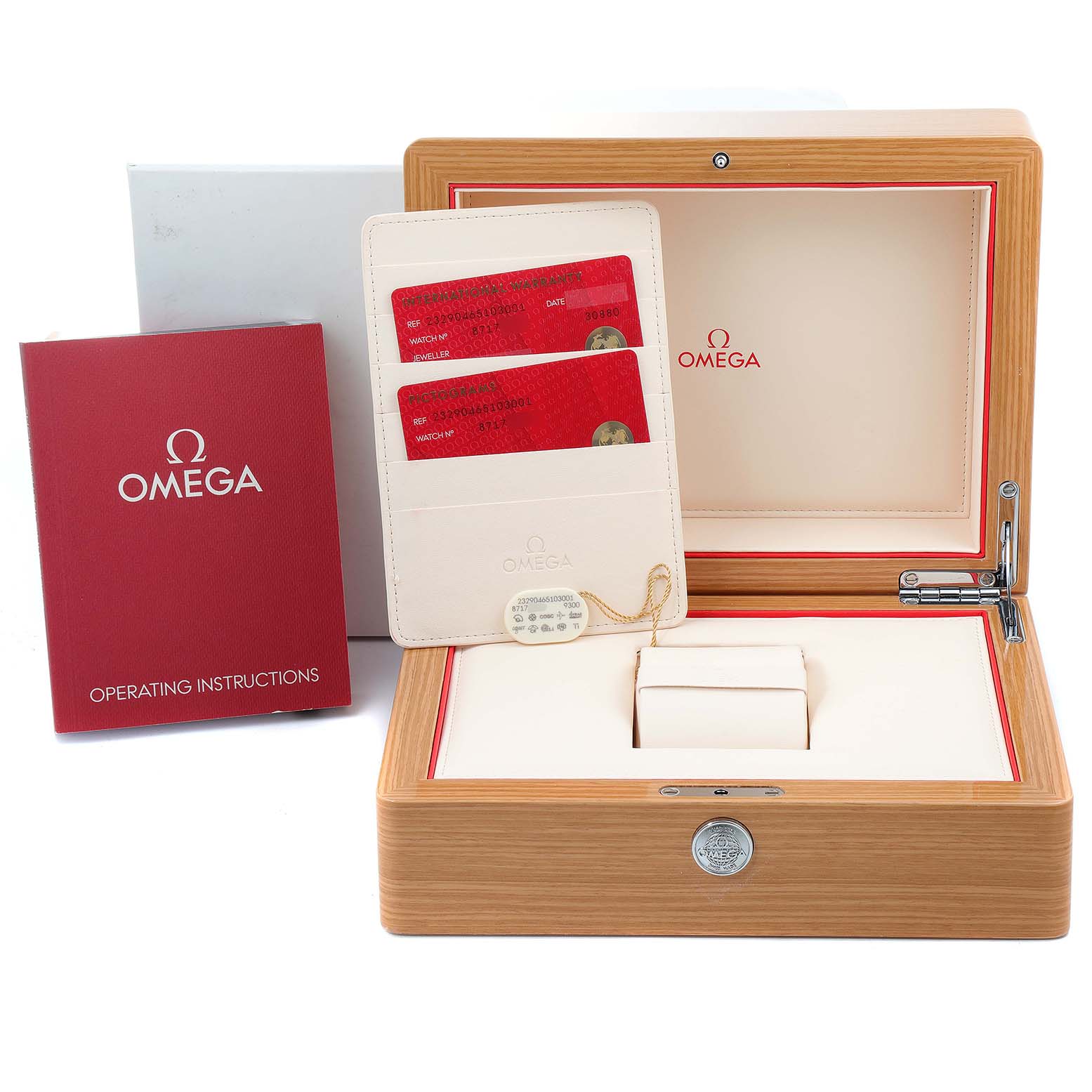 The image shows an open wooden box, operating instructions, cards, and a holder for the Omega Planet Ocean 232.90.46.51.03.001 Men's Titanium Blue Dial 232.90.46.51.03.001 Men's Titanium Blue Dial watch.