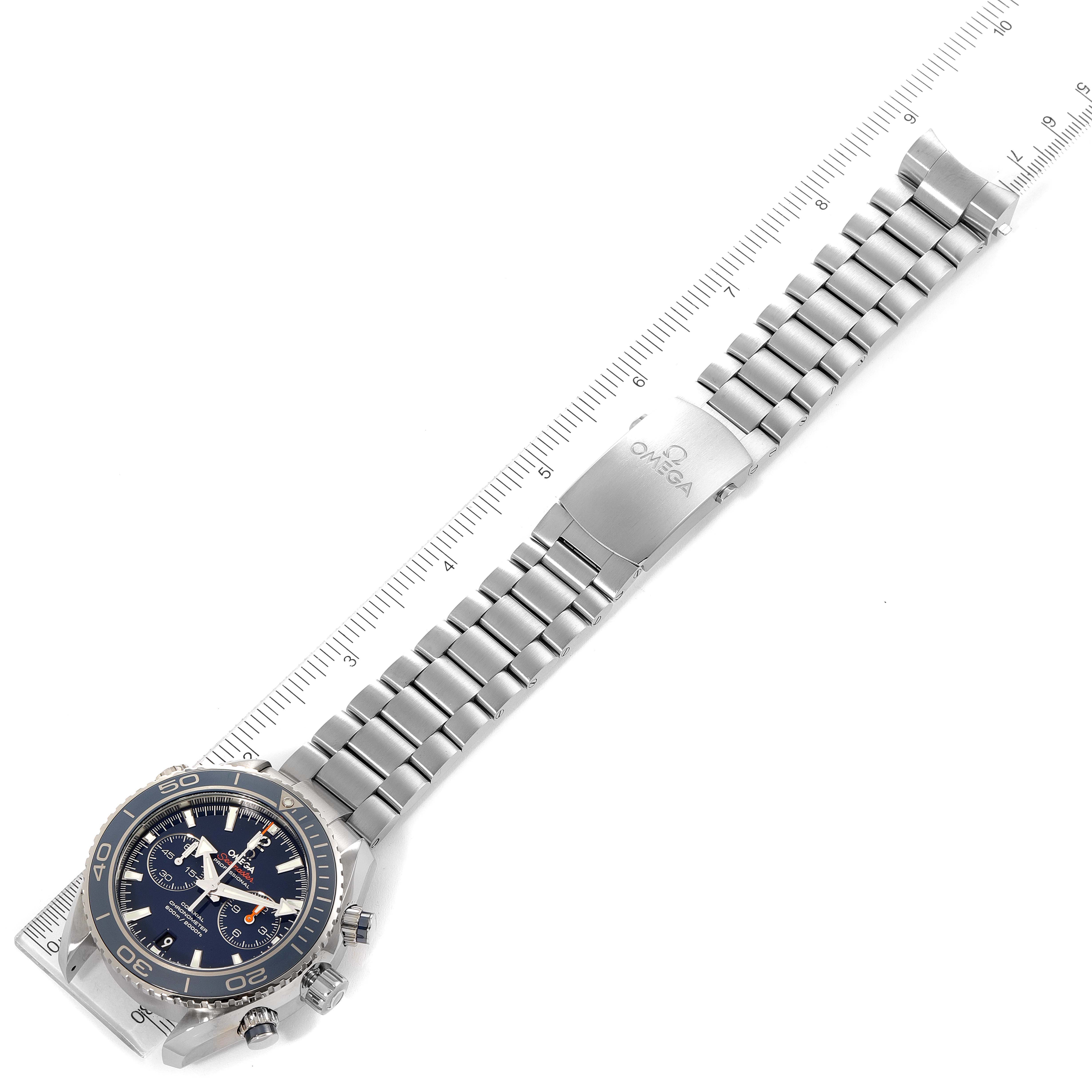 The image shows an overhead view of the Omega Planet Ocean 232.90.46.51.03.001 Men's Titanium Blue Dial 232.90.46.51.03.001 Men's Titanium Blue Dial watch, highlighting the face, bezel, and stainless steel bracelet with clasp.